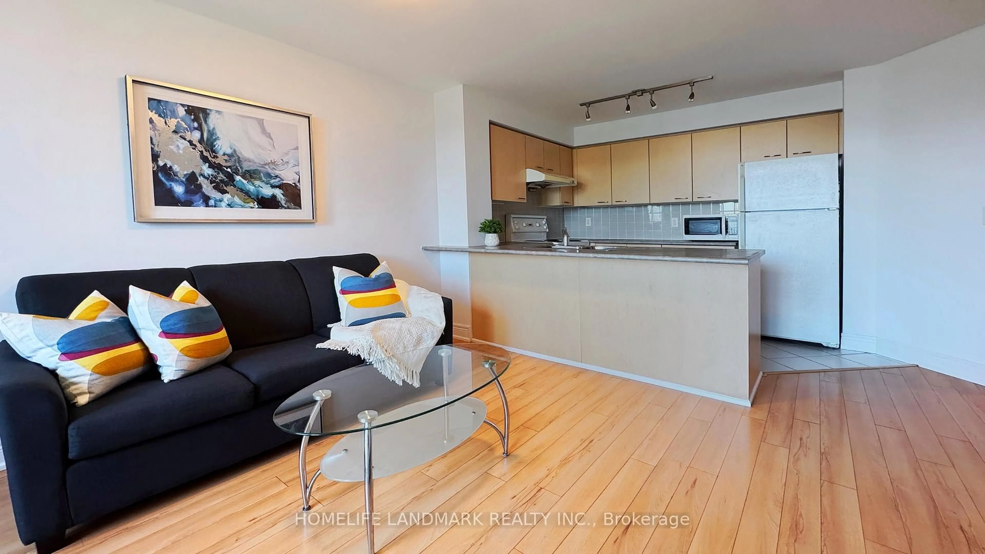 Living room with furniture, wood/laminate floor for 62 Suncrest Blvd #826, Markham Ontario L3T 7Y6
