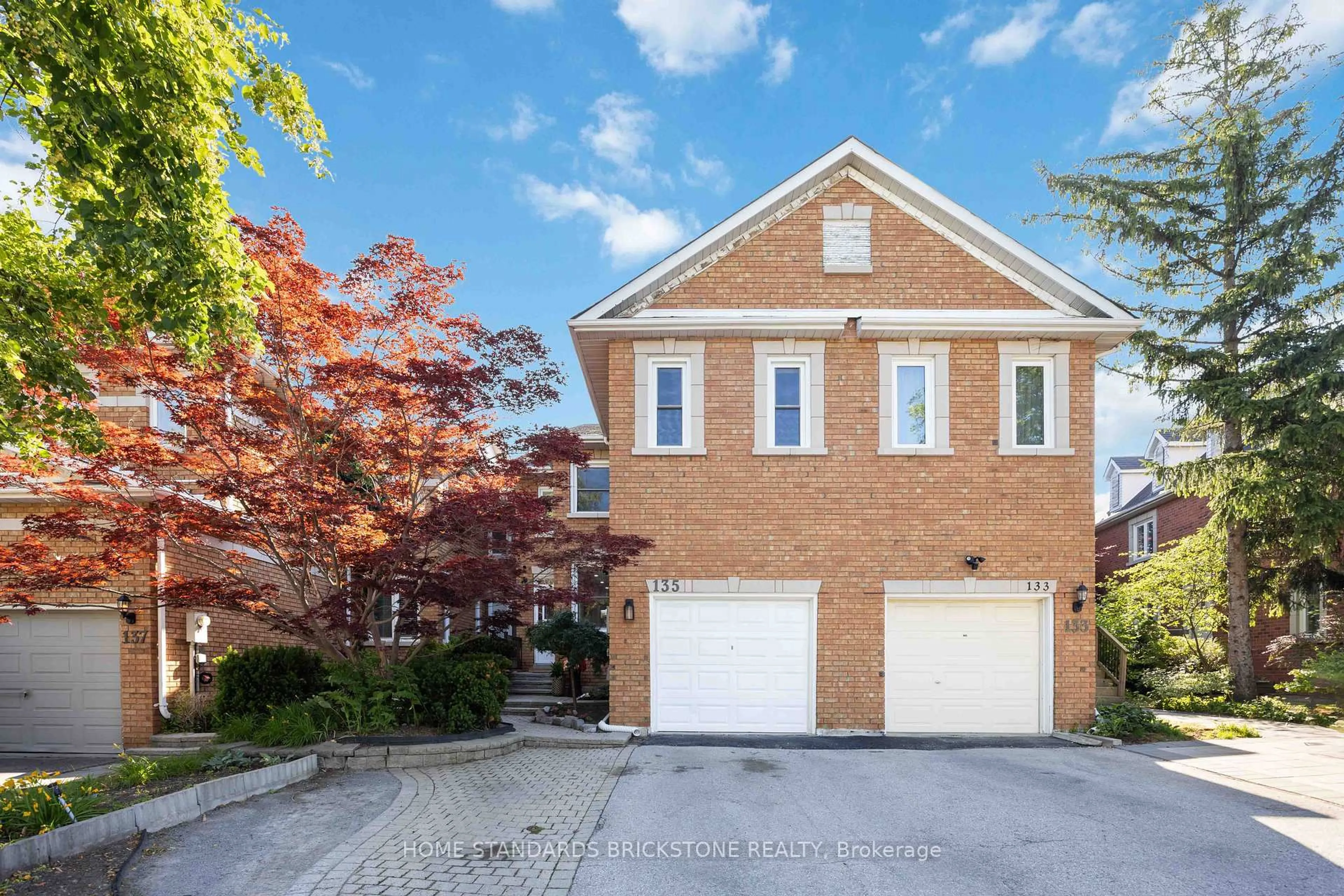 Home with brick exterior material, street for 135 Brownstone Circ, Vaughan Ontario L4J 7P5