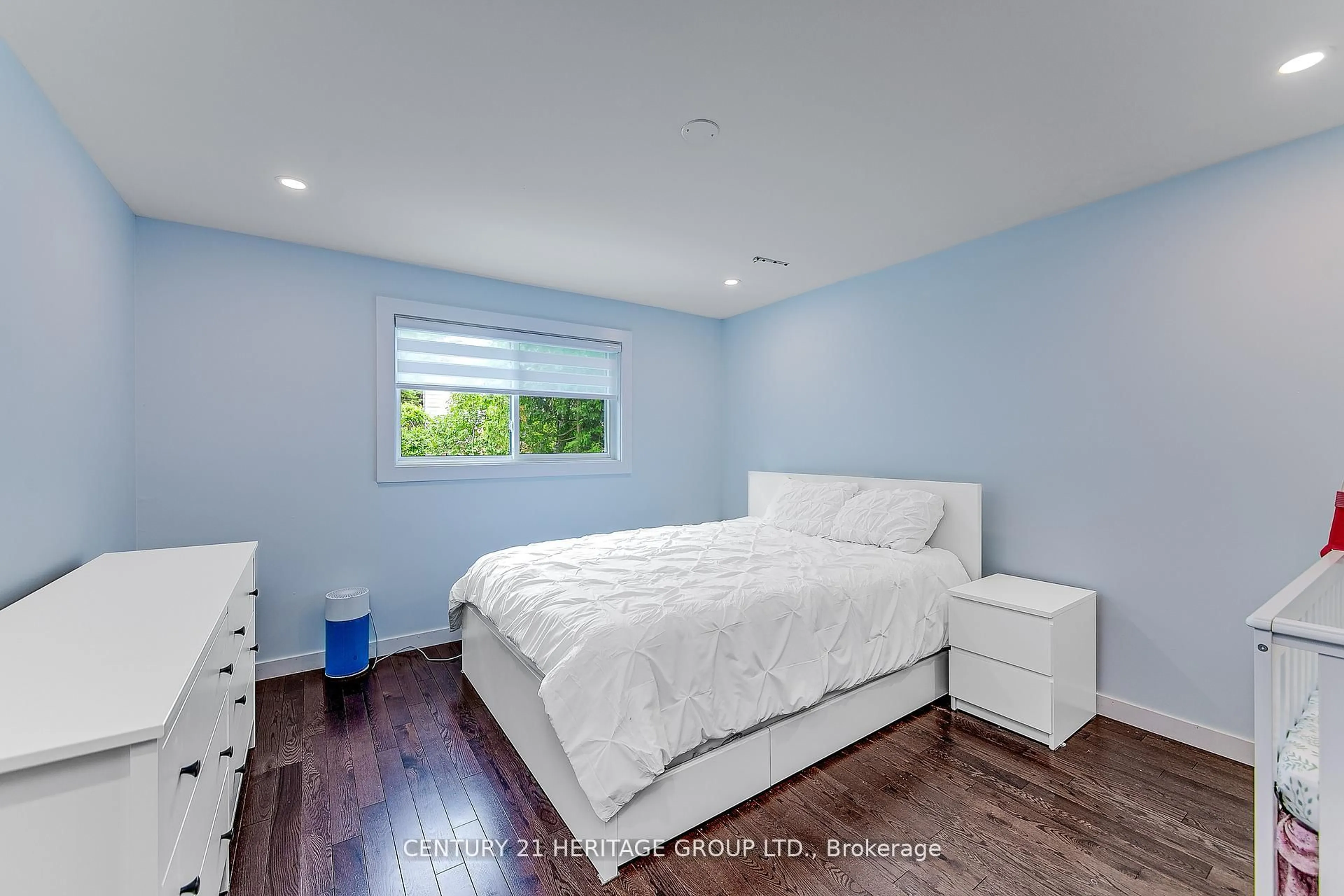 Bedroom with bed, wood/laminate floor for 68 Adeline Ave, New Tecumseth Ontario L0G 1W0