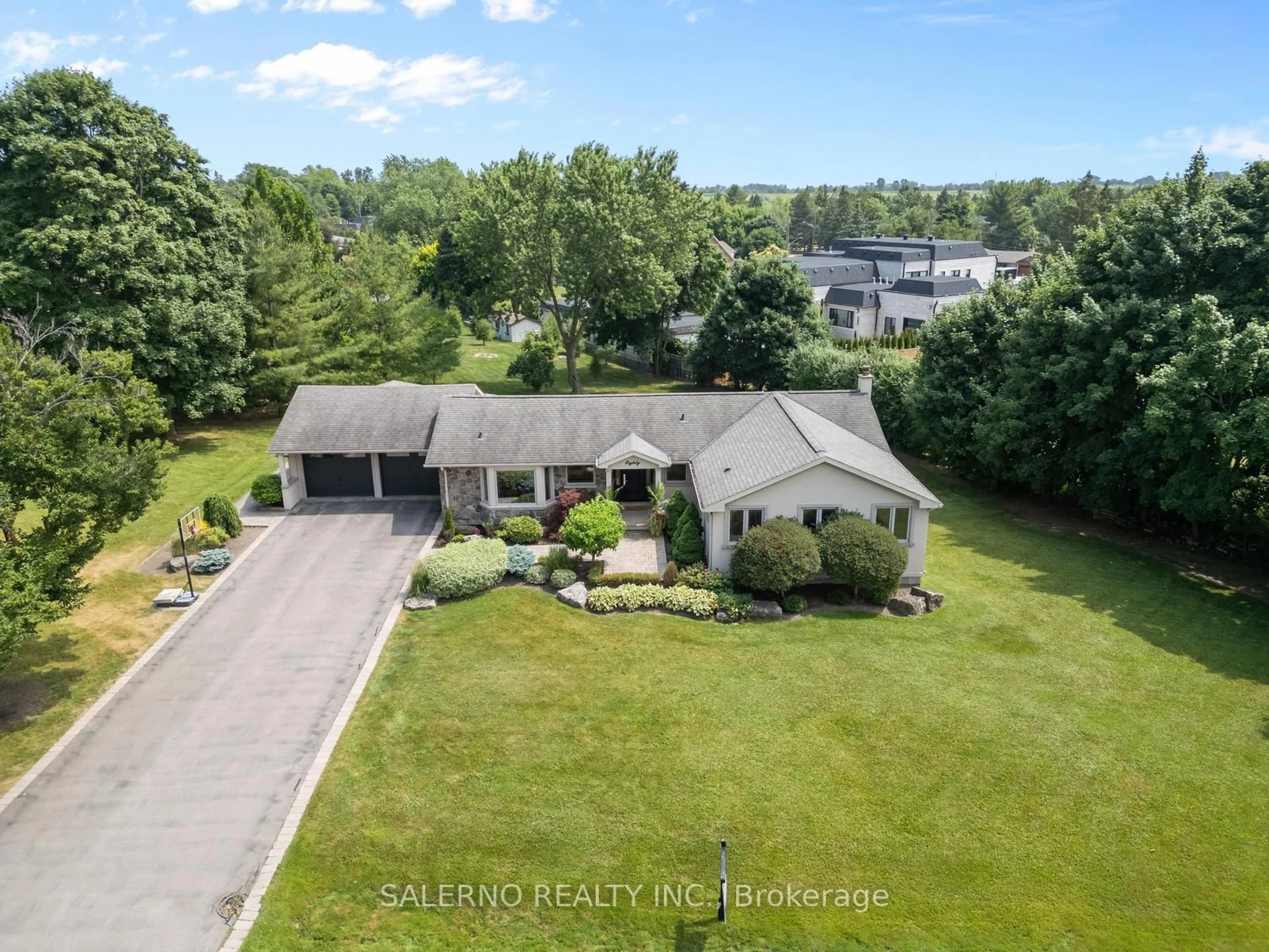 A pic from outside/outdoor area/front of a property/back of a property/a pic from drone, water/lake/river/ocean view for 80 Noblewood Dr, King Ontario L0G 1N0