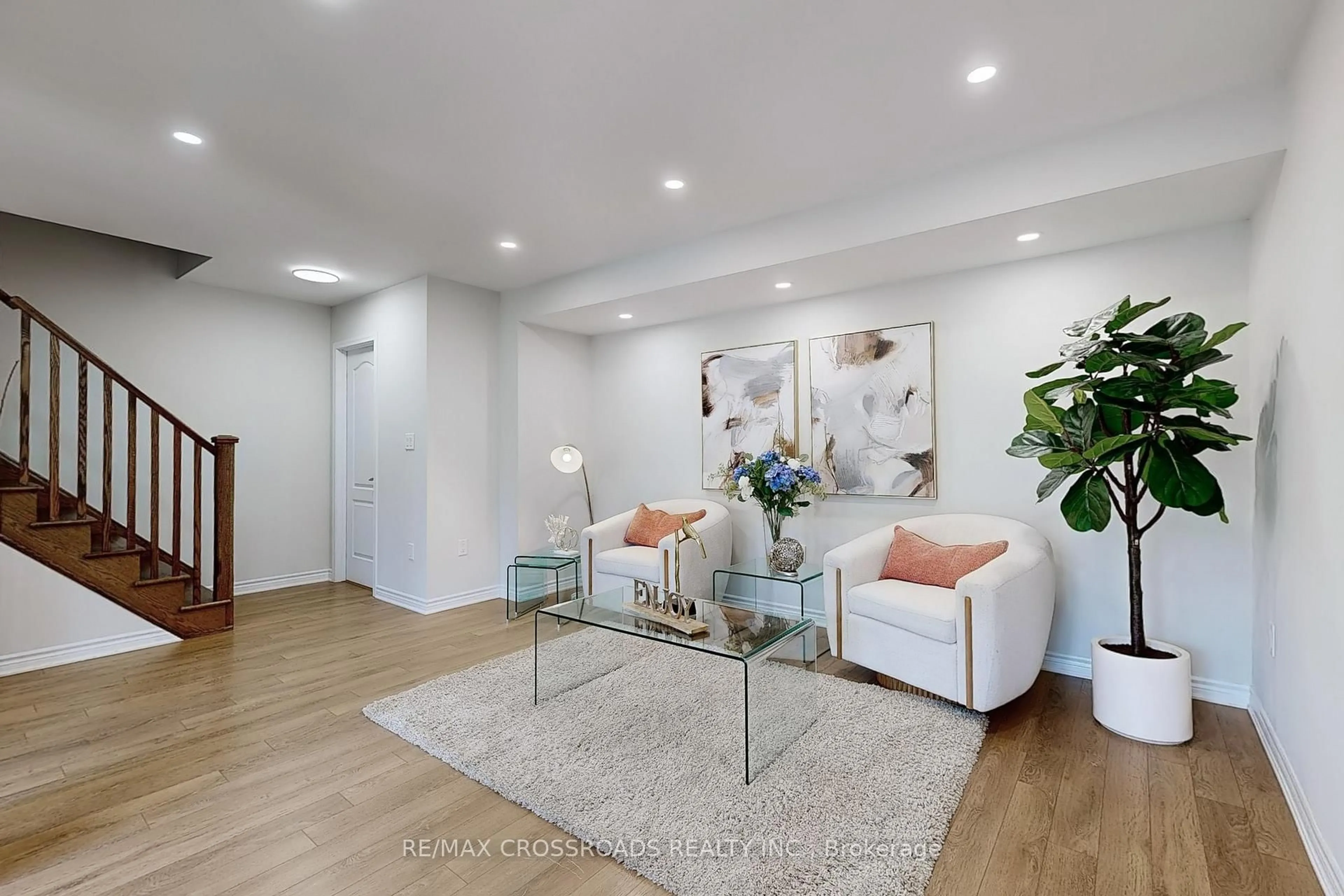 Living room with furniture, wood/laminate floor for 90 Minlow Way, Aurora Ontario L4G 0Y1