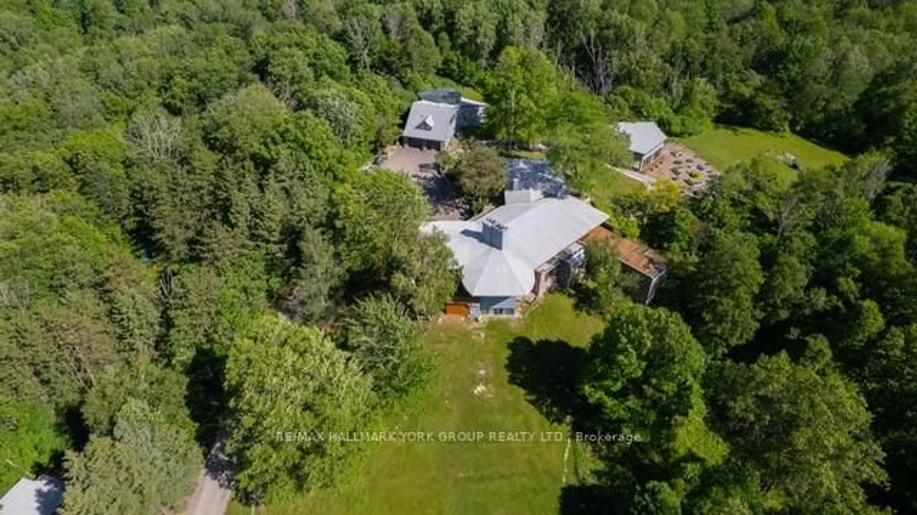A pic from outside/outdoor area/front of a property/back of a property/a pic from drone, forest/trees view for 4235 17 Sdrd, King Ontario L7B 1K4