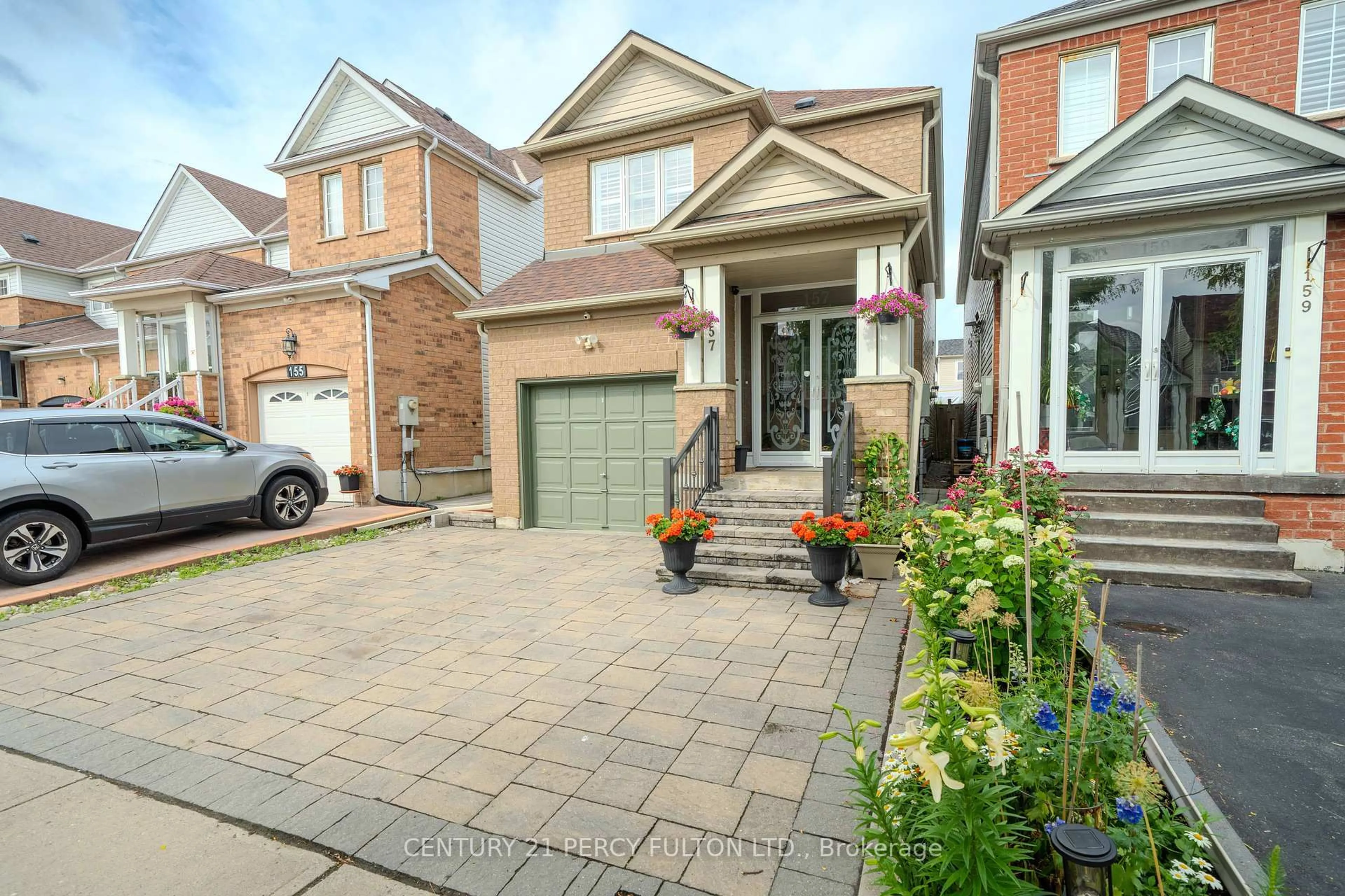 Home with brick exterior material, street for 157 Billingsley Cres, Markham Ontario L3S 4P3