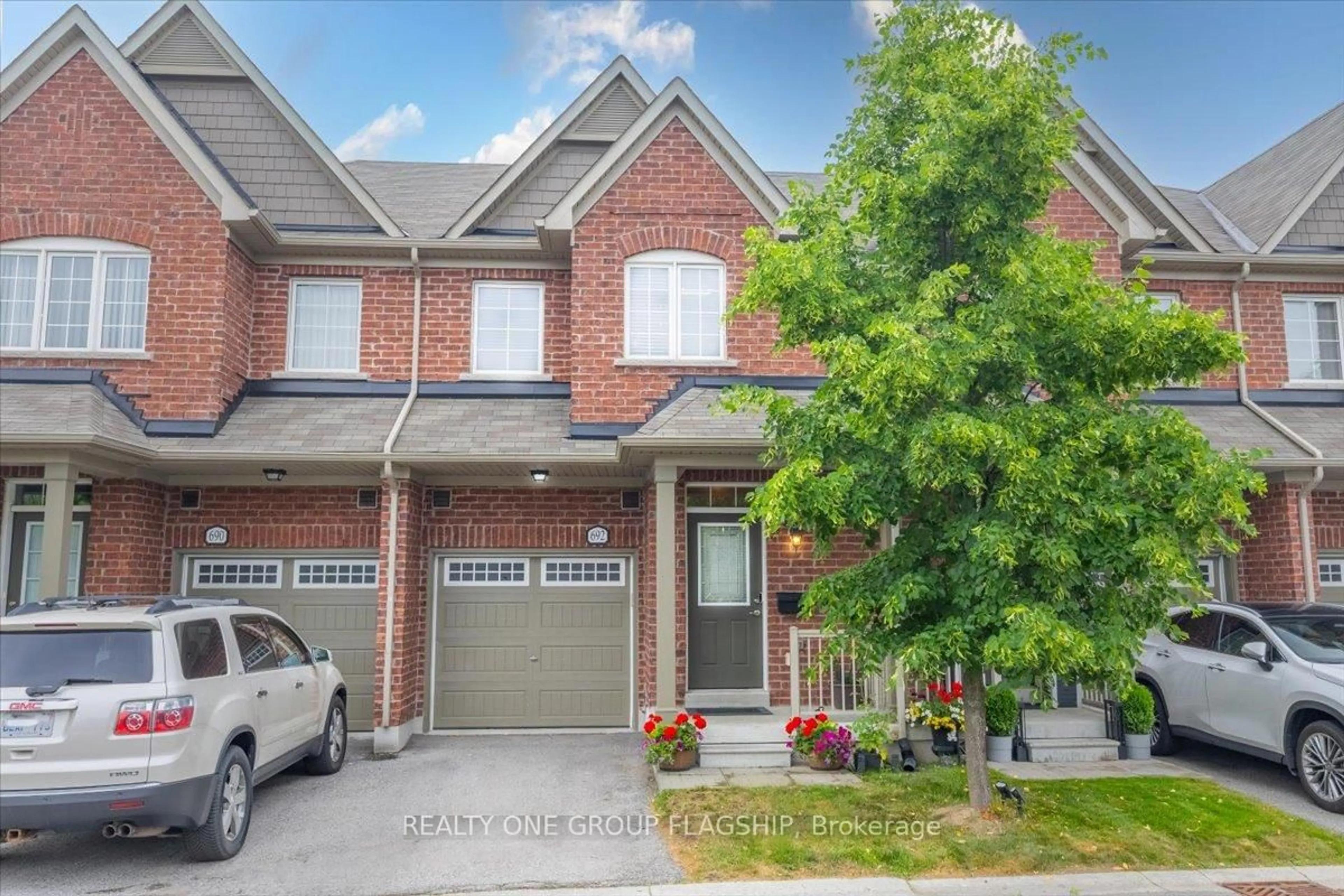 Home with brick exterior material, street for 692 Wendy Culbert Cres, Newmarket Ontario L3X 0A4