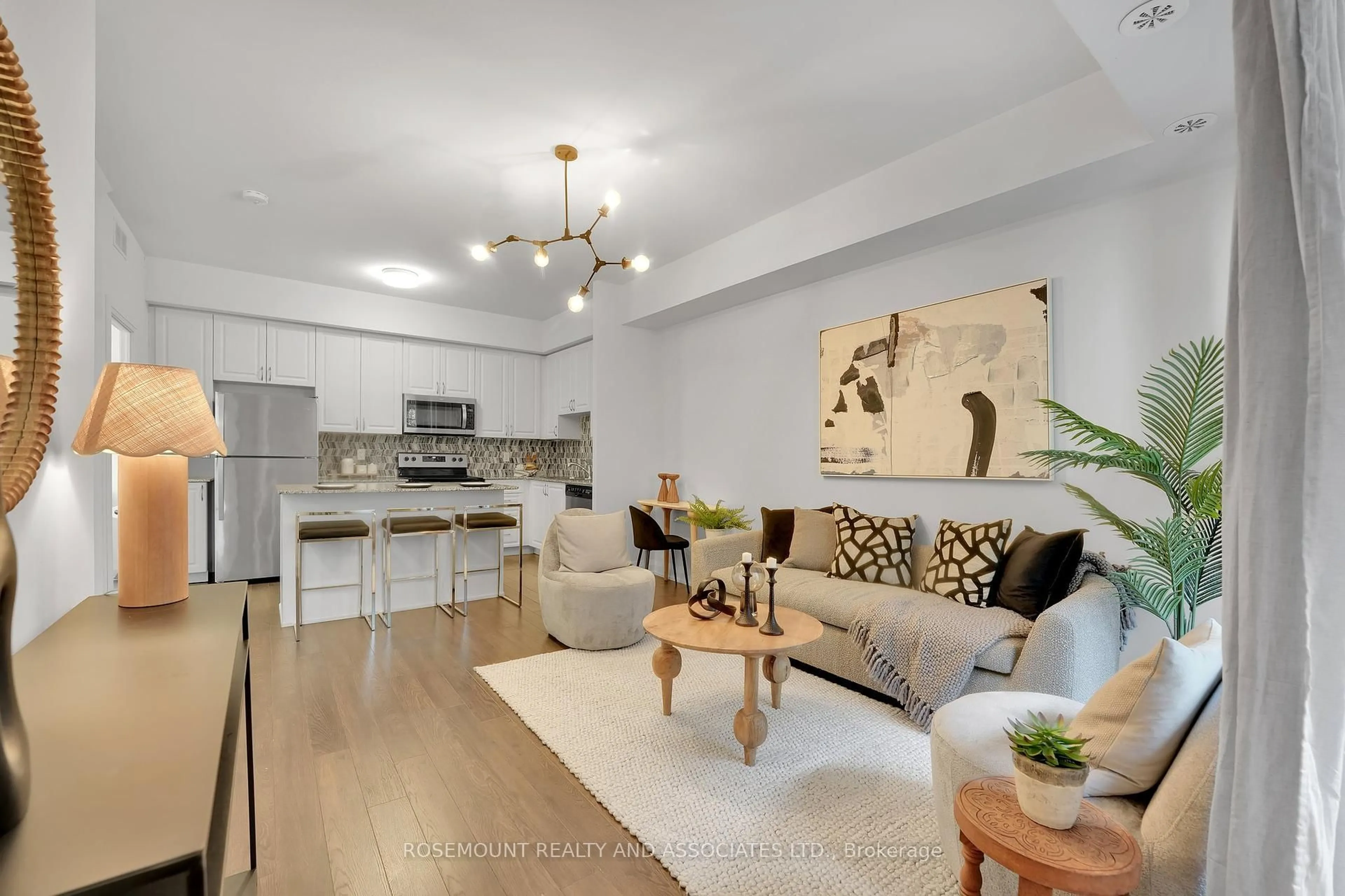 Open concept kitchen, wood/laminate floor for 5299 Highway 07 Rd #c402, Vaughan Ontario L4L 0J1