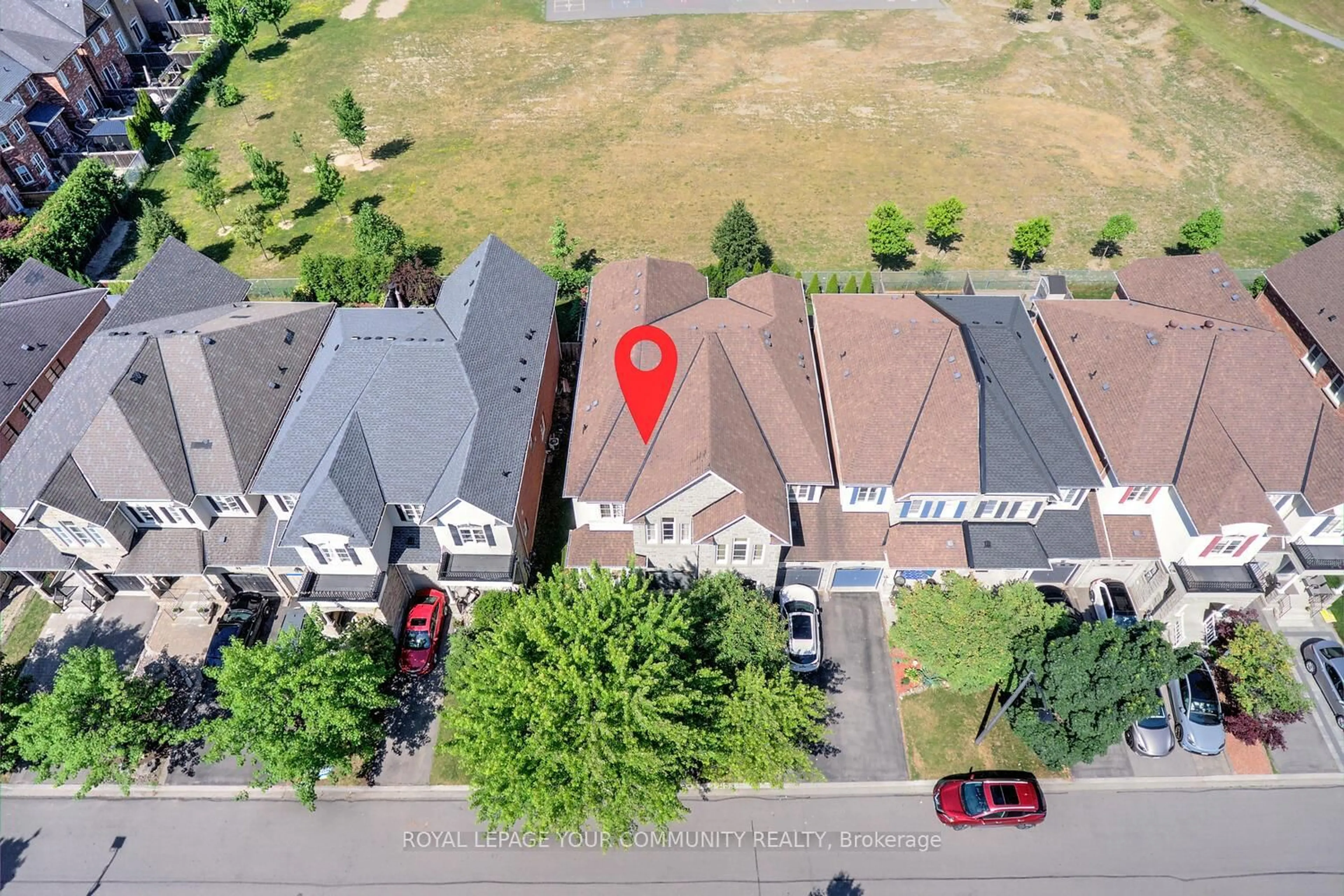 A pic from outside/outdoor area/front of a property/back of a property/a pic from drone, street for 24 Mill River Dr, Vaughan Ontario L6A 0Y7