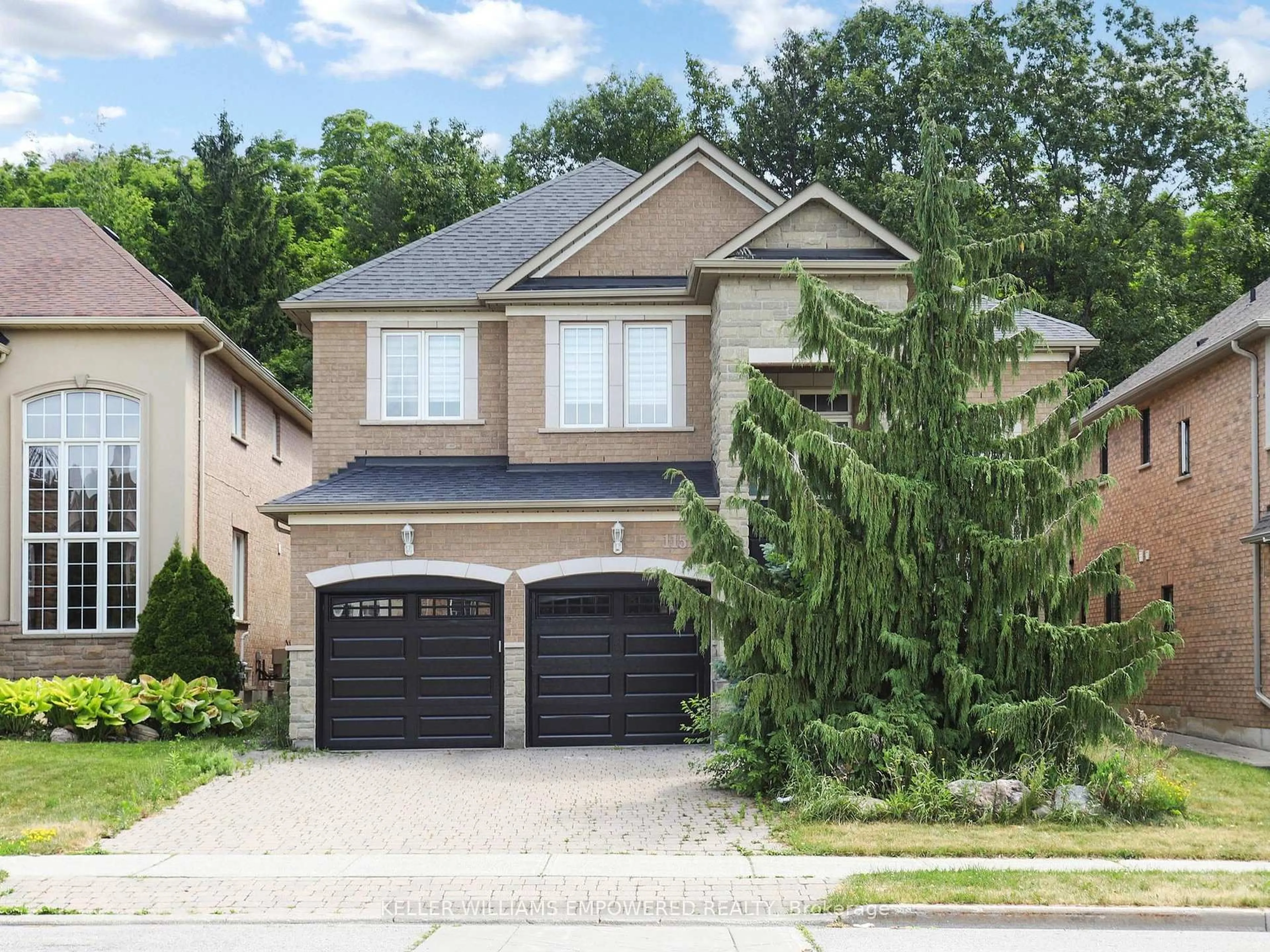 Home with brick exterior material, street for 115 Thornhill Woods Dr, Vaughan Ontario L4J 8R5