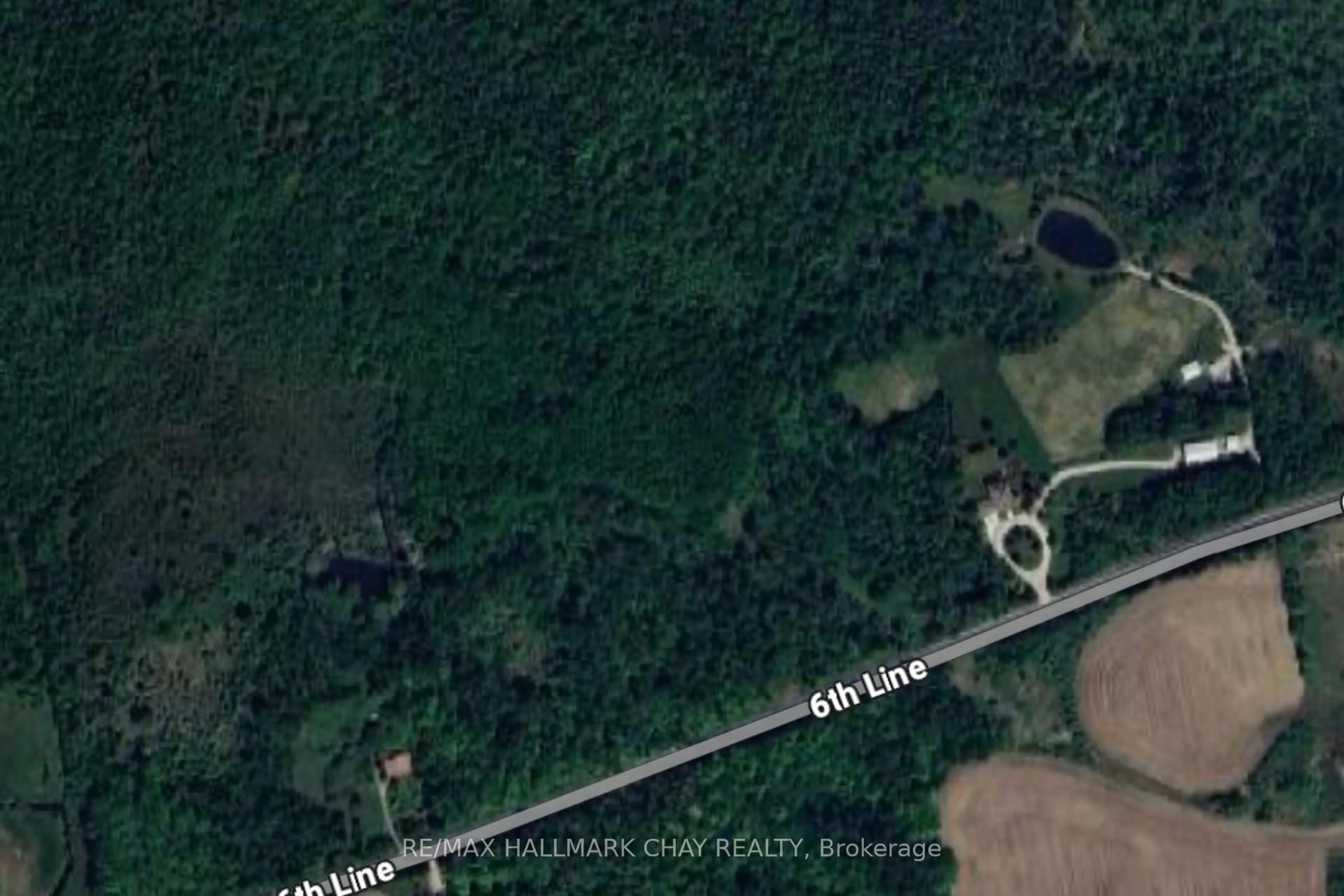 A pic from outside/outdoor area/front of a property/back of a property/a pic from drone, forest/trees view for 2580 6th Line, Innisfil Ontario L9S 4S3