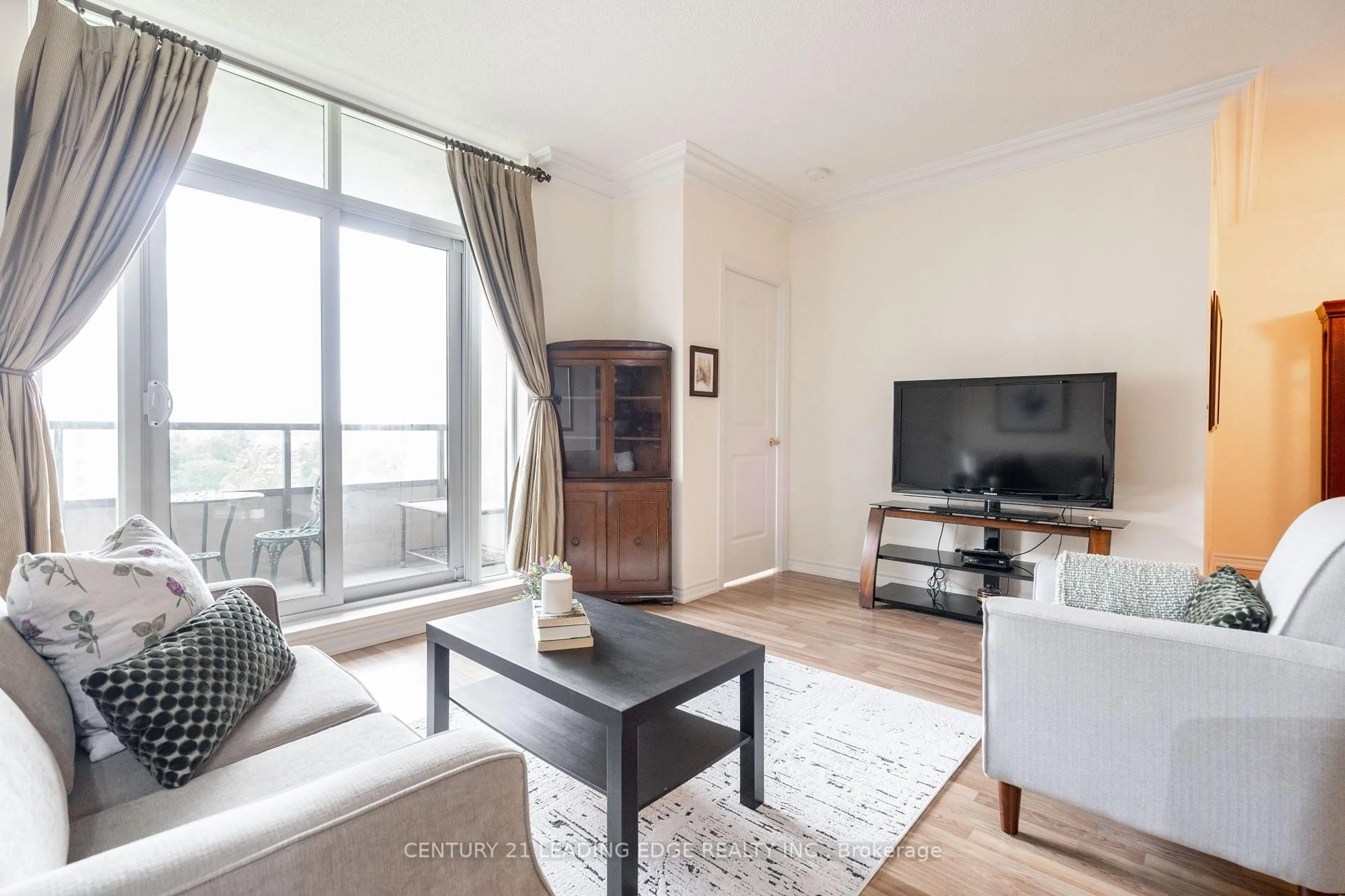 Living room with furniture, wood/laminate floor for 9225 Jane St #708, Vaughan Ontario L6A 0J7