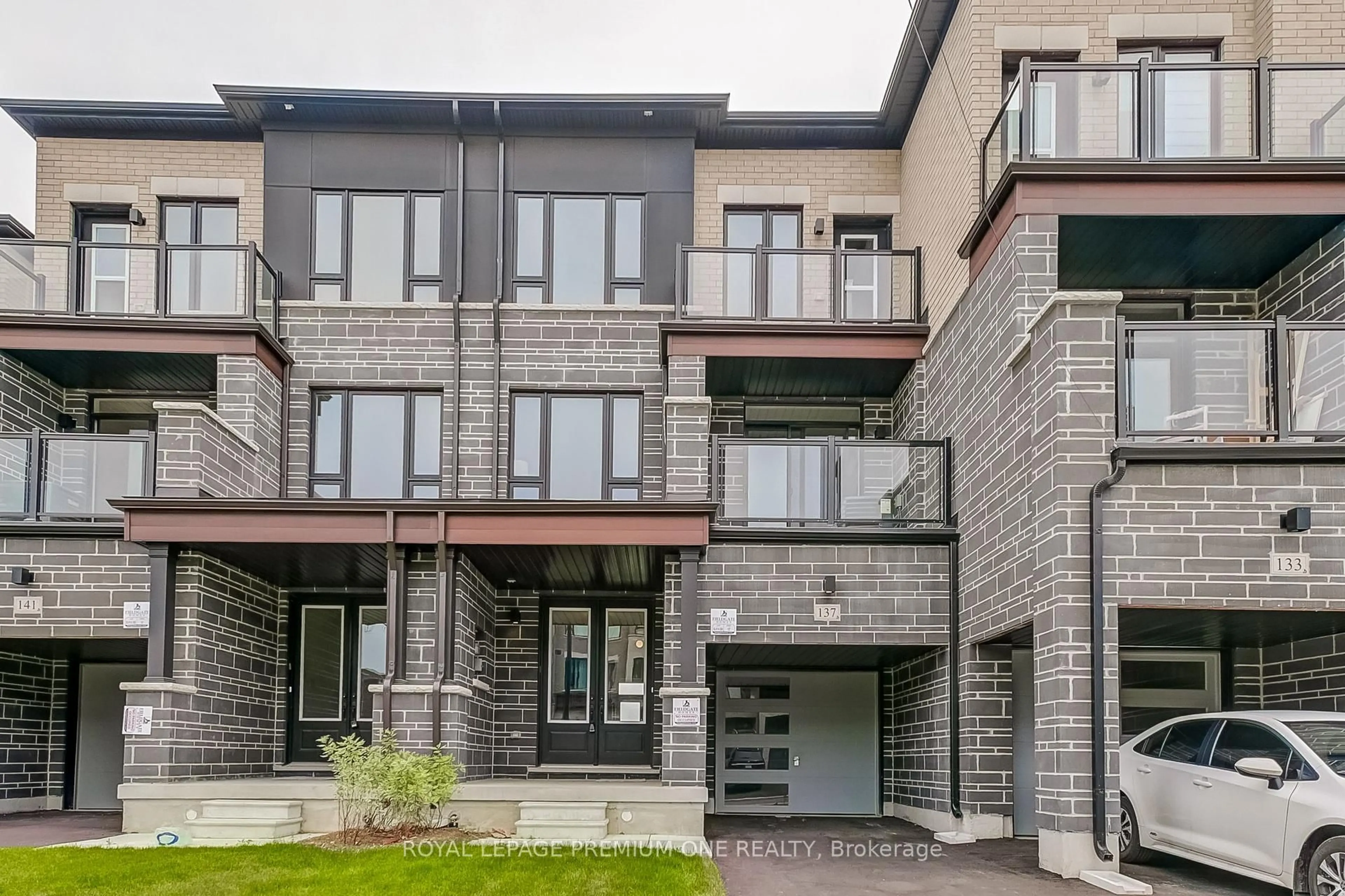 Home with brick exterior material, unknown for 137 Tennant Circ, Vaughan Ontario L4H 5L4