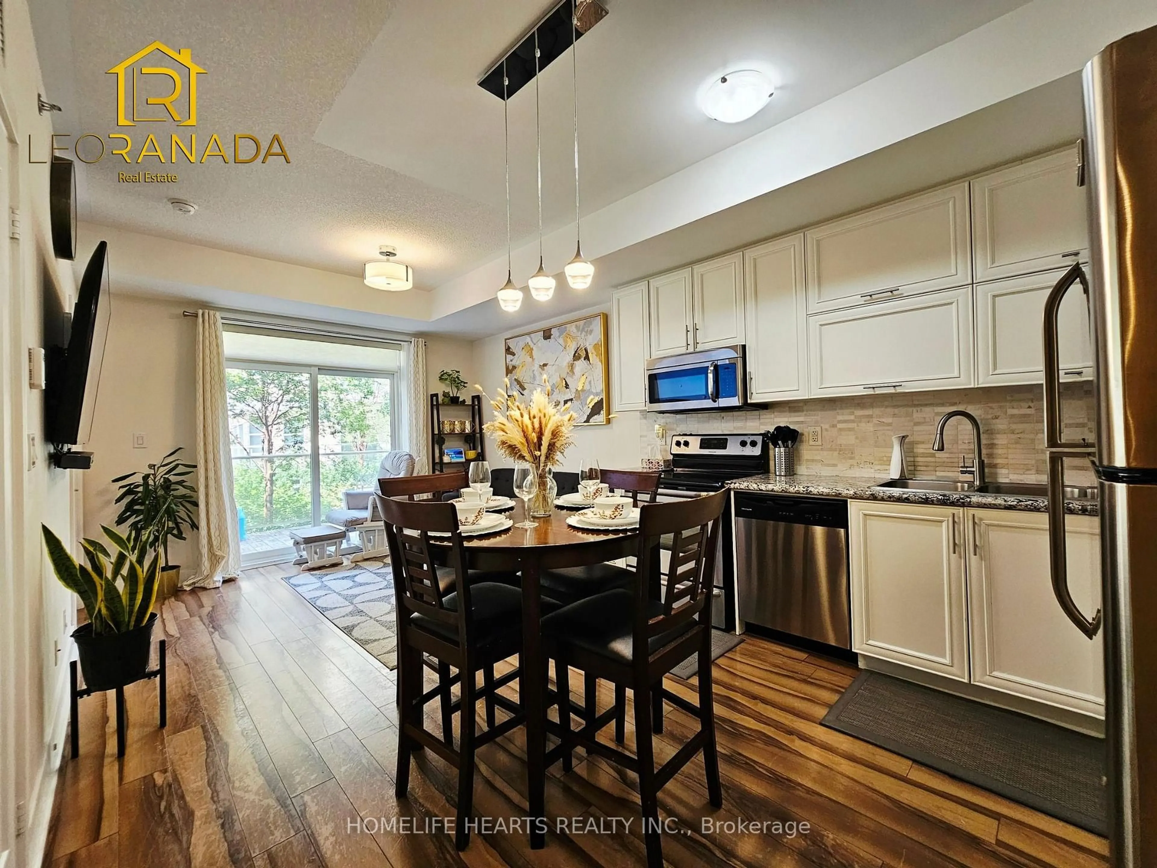 Open concept kitchen, wood/laminate floor for 28 Prince Regent St #104, Markham Ontario L6C 0V5