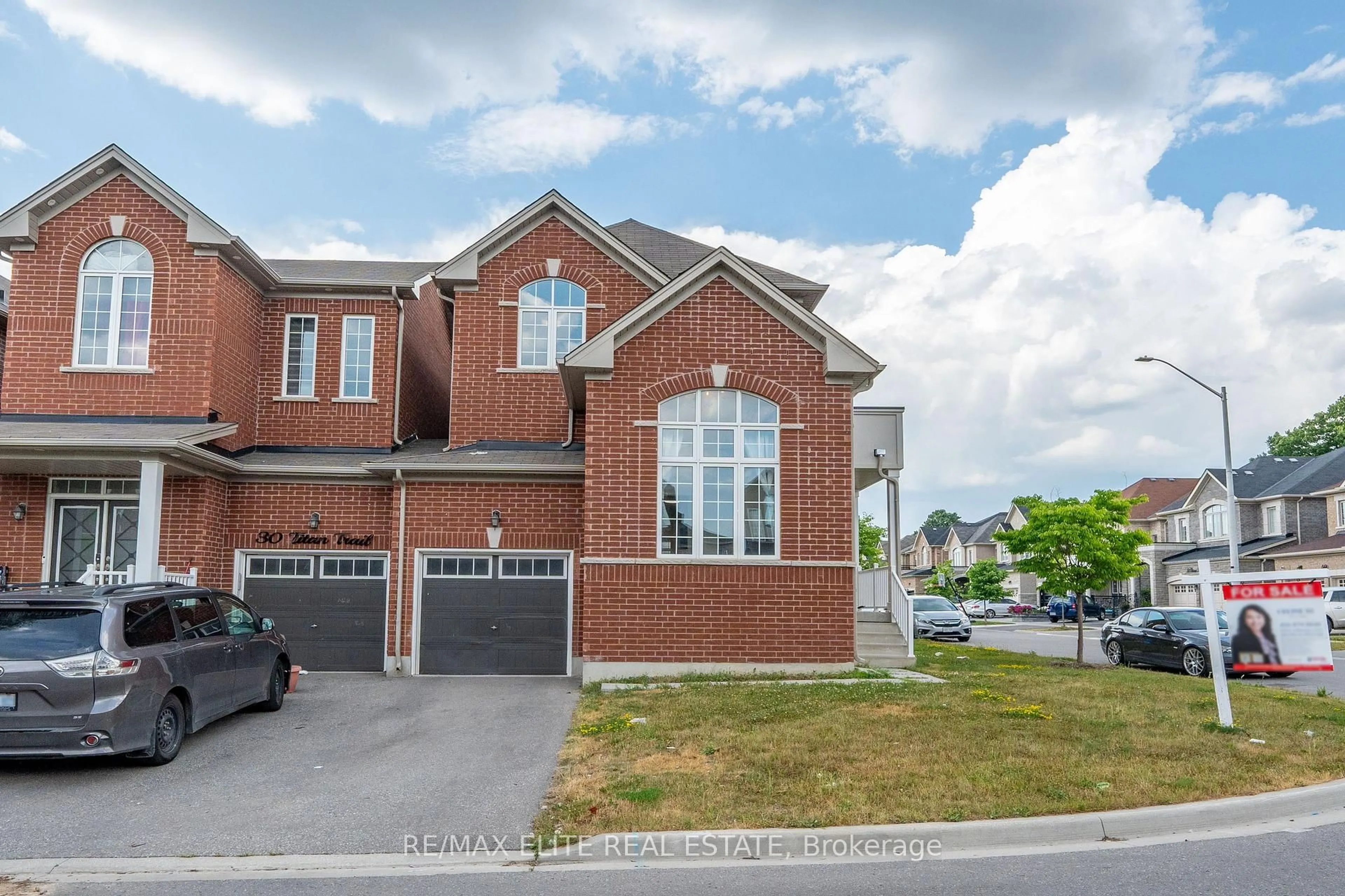 Home with brick exterior material, street for 32 Titan Tr, Markham Ontario L3S 0E2
