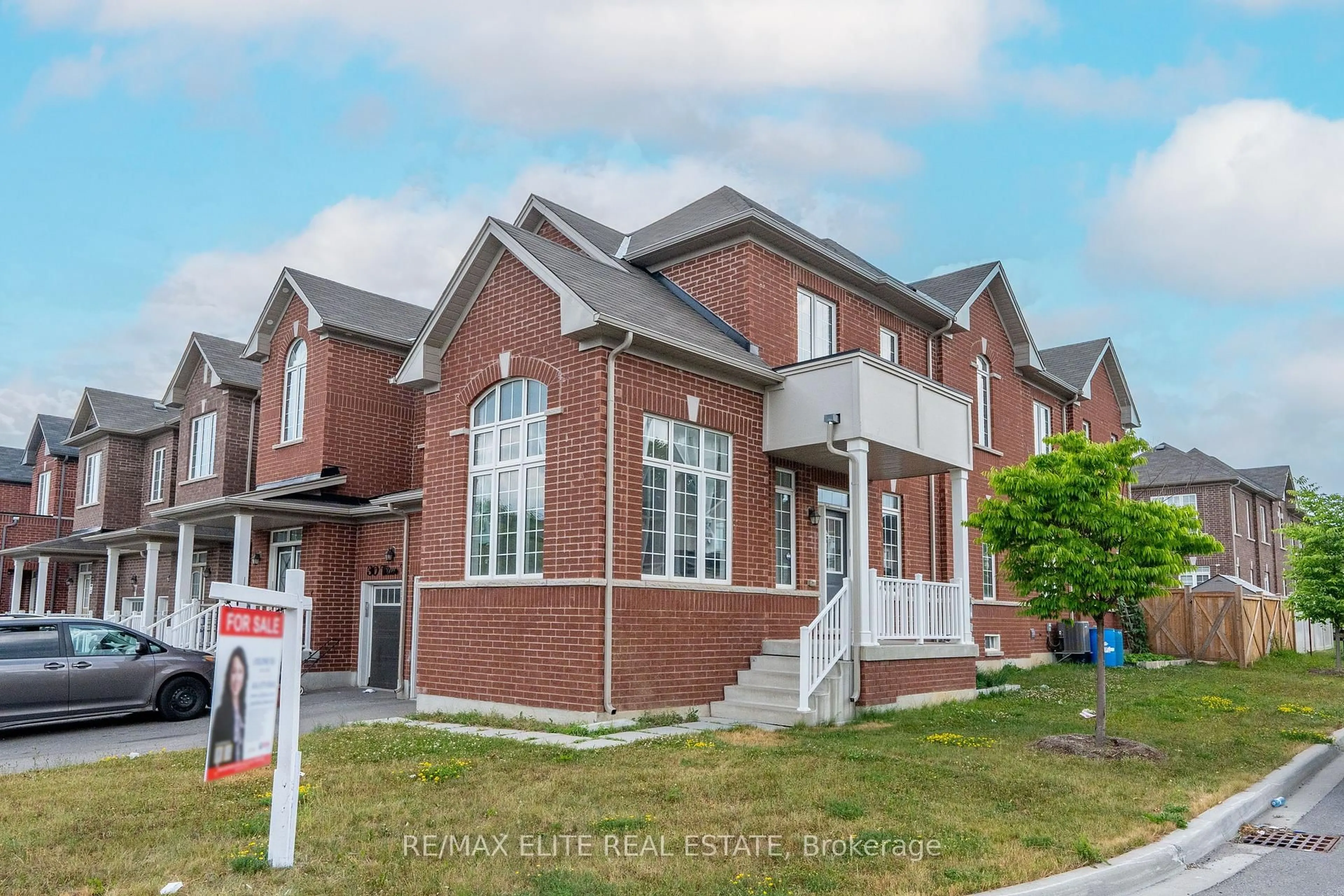 Home with brick exterior material, street for 32 Titan Tr, Markham Ontario L3S 0E2