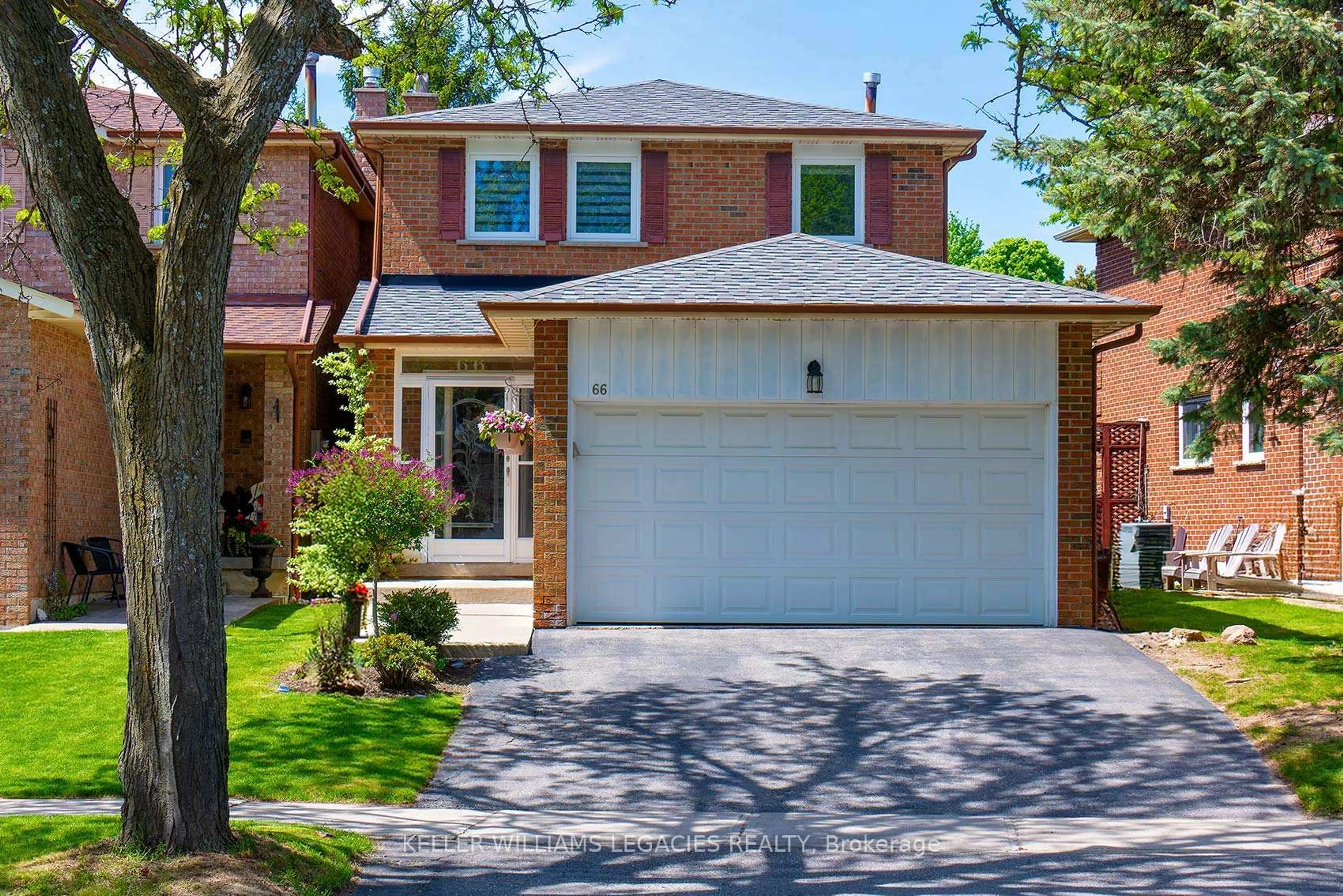Home with brick exterior material, street for 66 Delmark Blvd, Markham Ontario L3P 3Z6