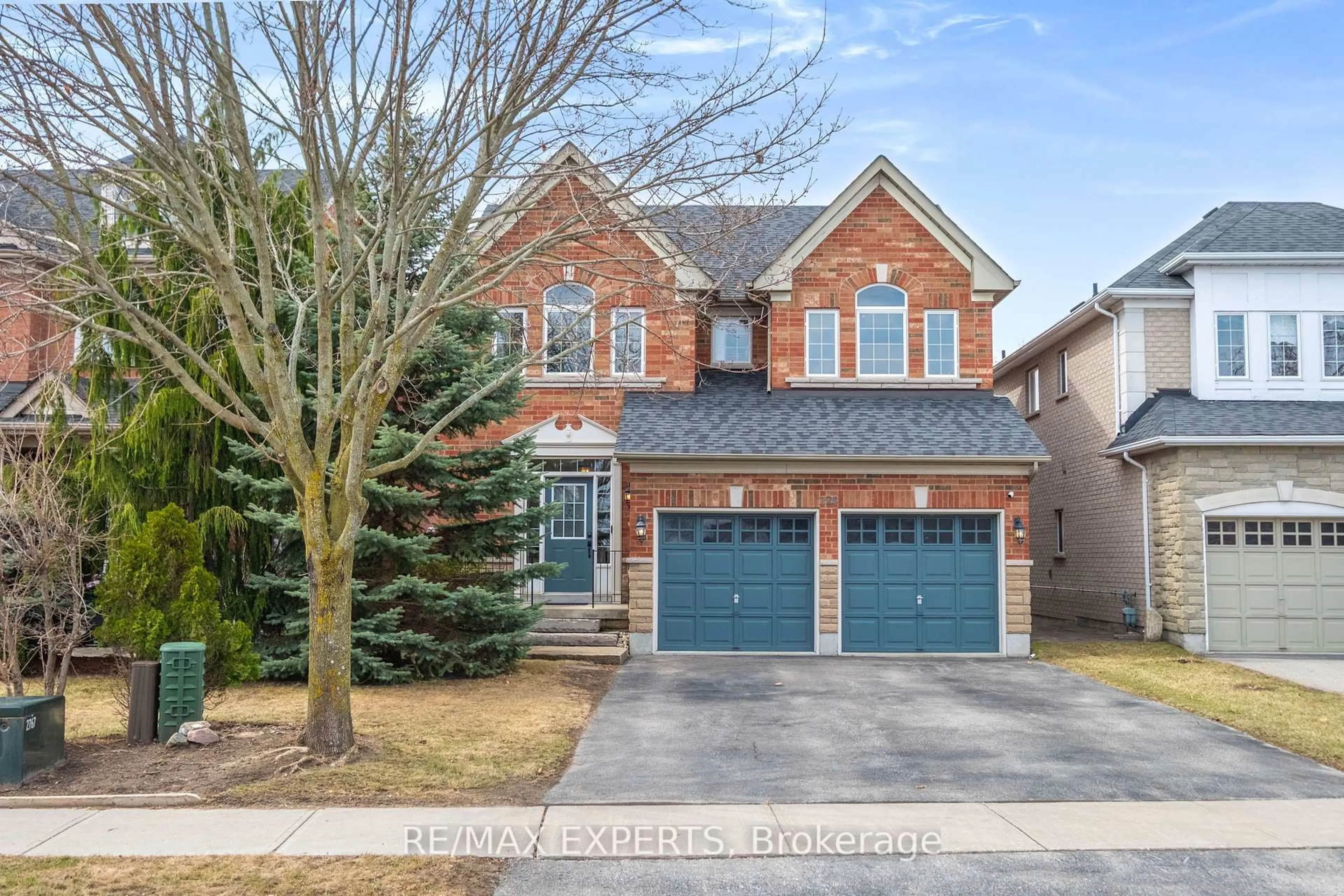 Home with brick exterior material, street for 228 Sawmill Valley Dr, Newmarket Ontario L3X 2W1