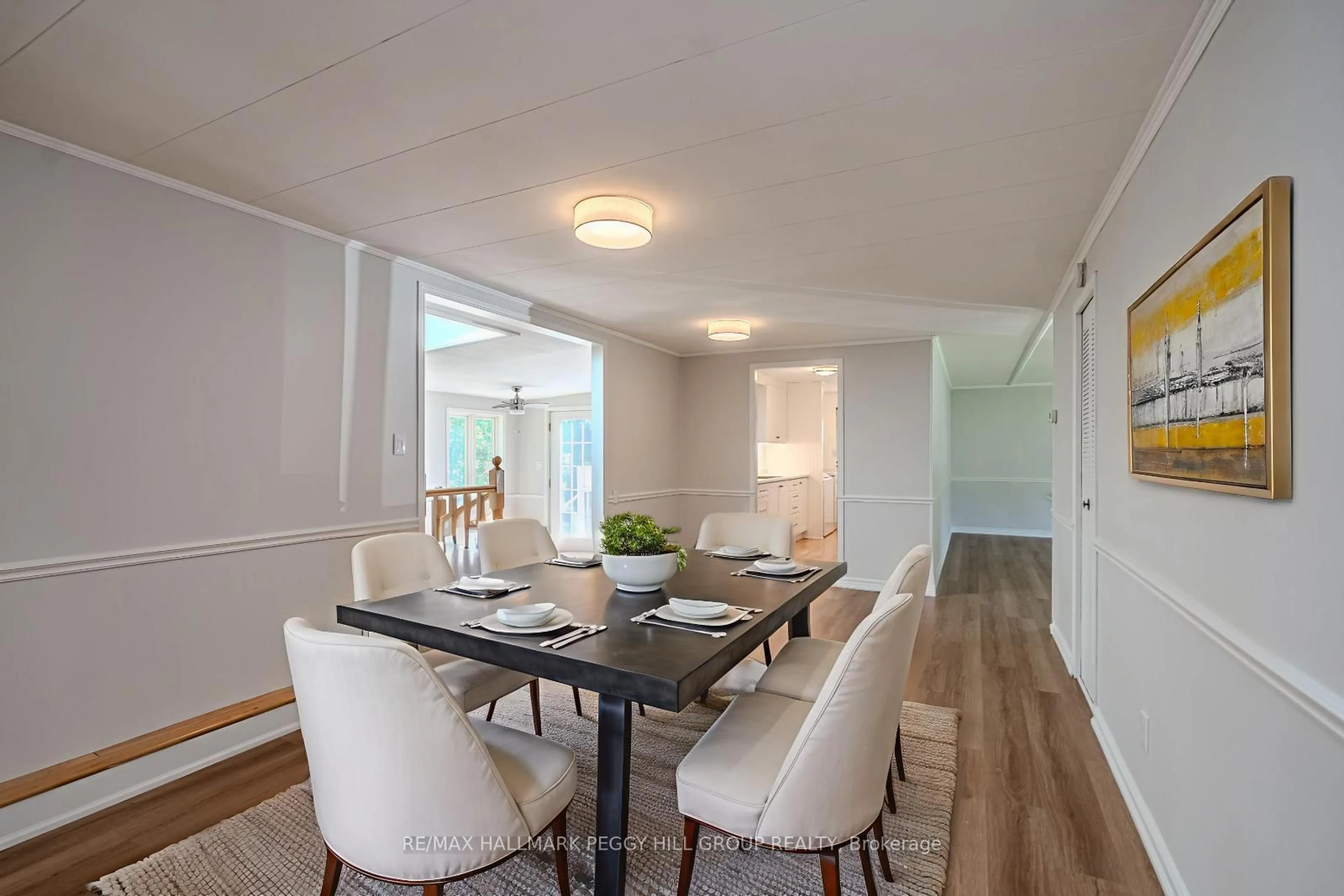 Dining room, wood/laminate floor for 12 Flora Crt, Innisfil Ontario L9S 1R3
