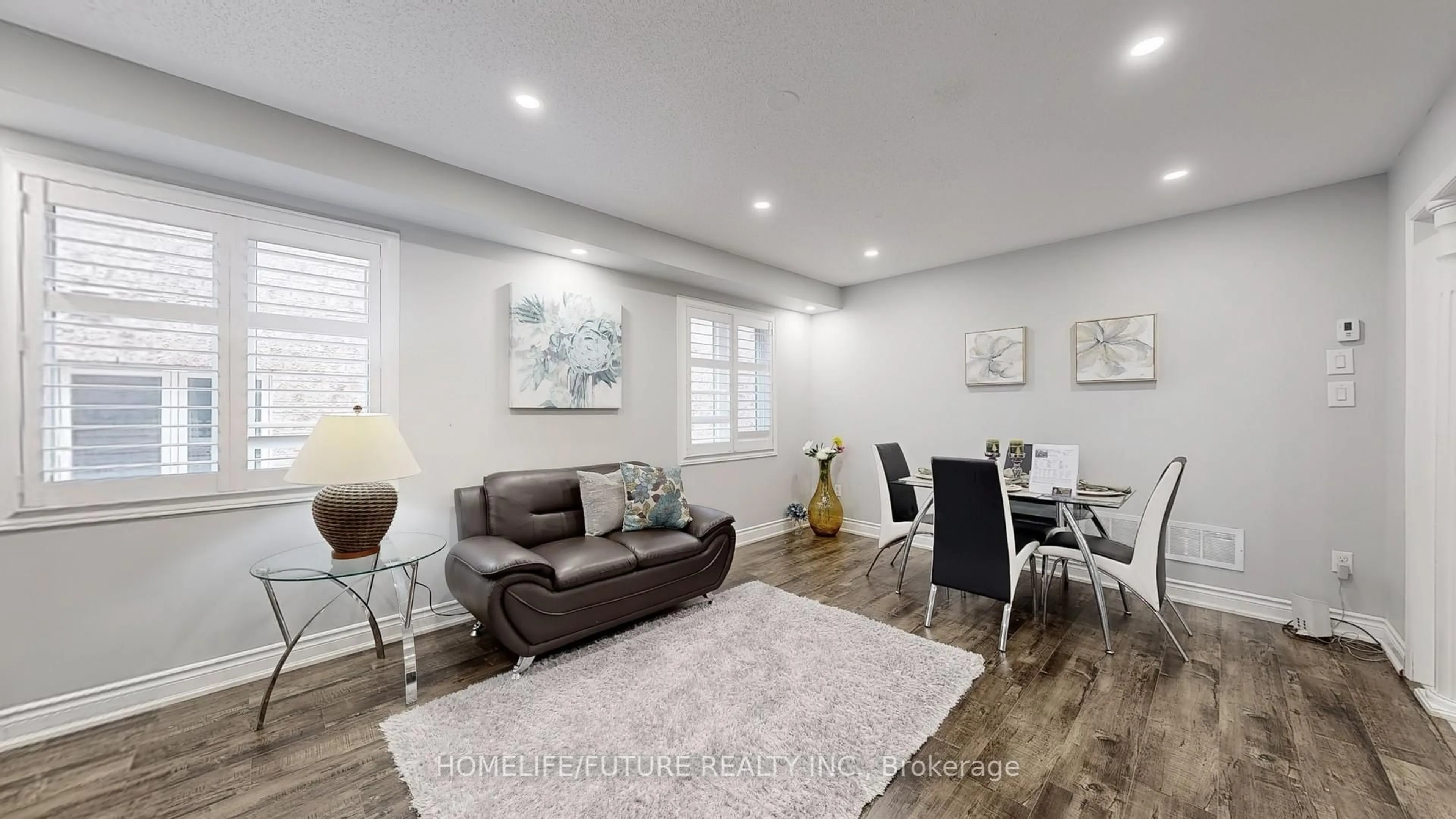 Living room with furniture, wood/laminate floor for 153 Jonas Millway, Whitchurch-Stouffville Ontario L4A 0M9