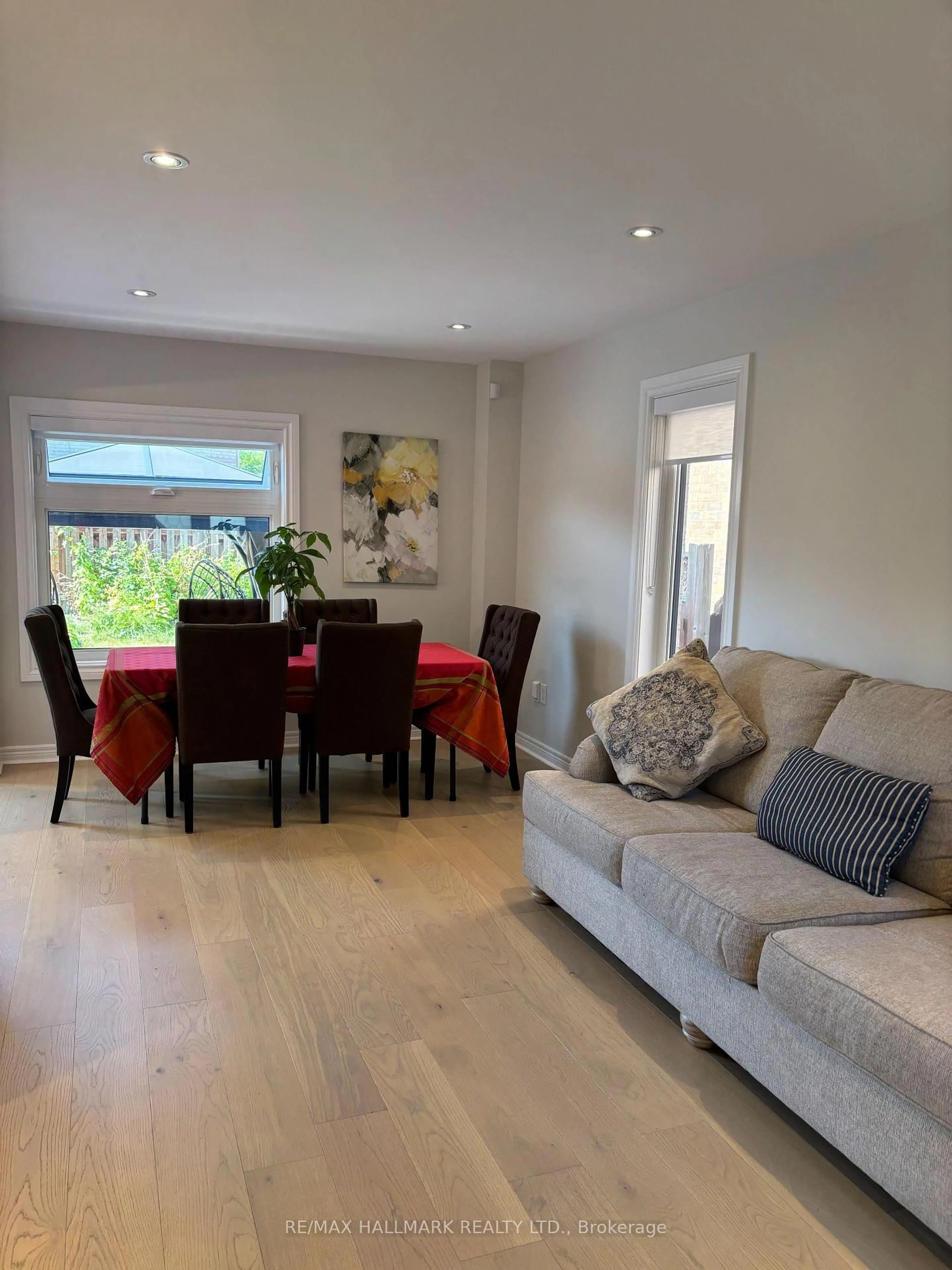 Living room with furniture, wood/laminate floor for 22 Laura Sabrina Dr, Vaughan Ontario L4H 1M6