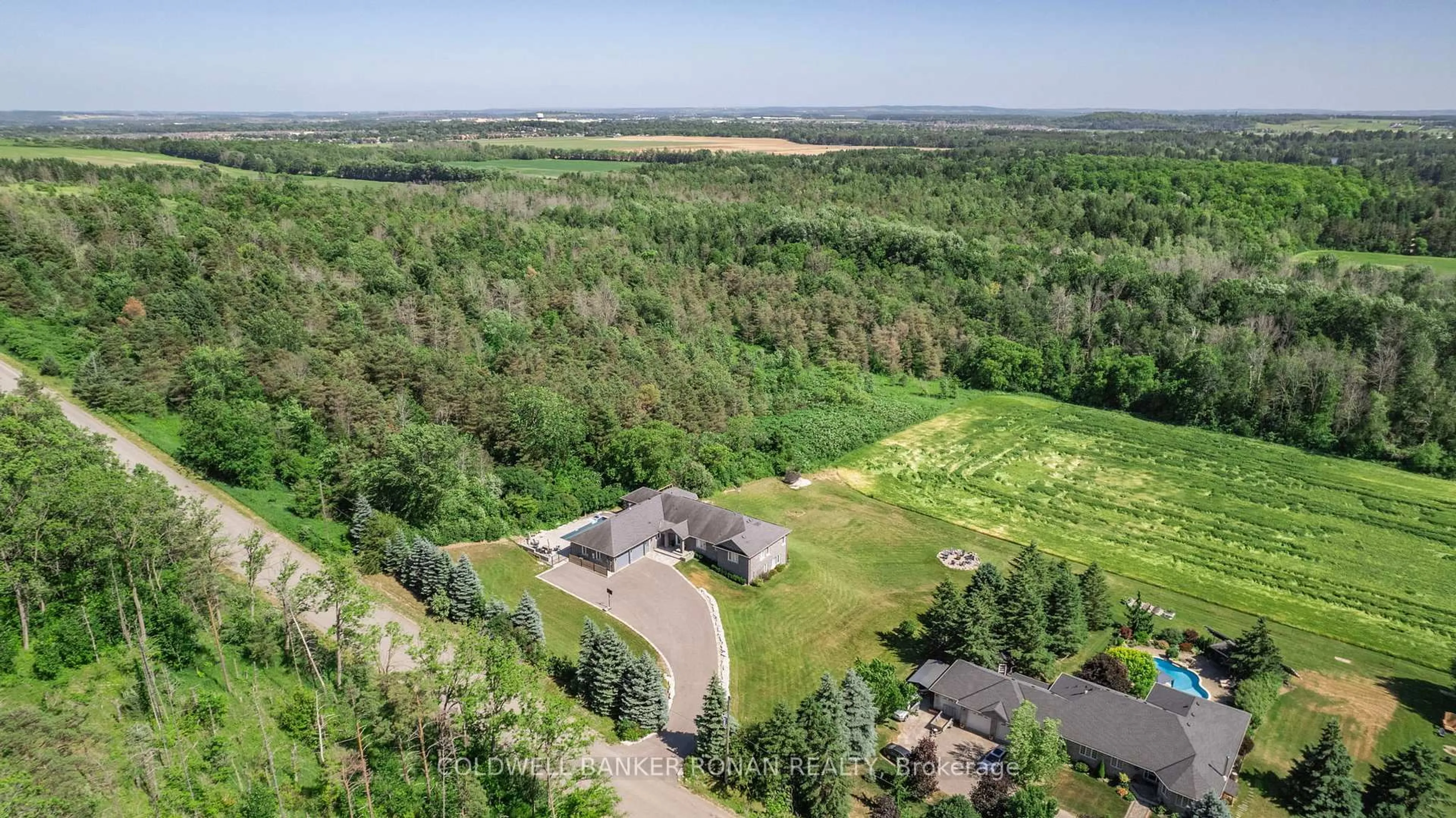 A pic from outside/outdoor area/front of a property/back of a property/a pic from drone, forest/trees view for 7765 5  Sideroad, Adjala-Tosorontio Ontario L9R 1V3