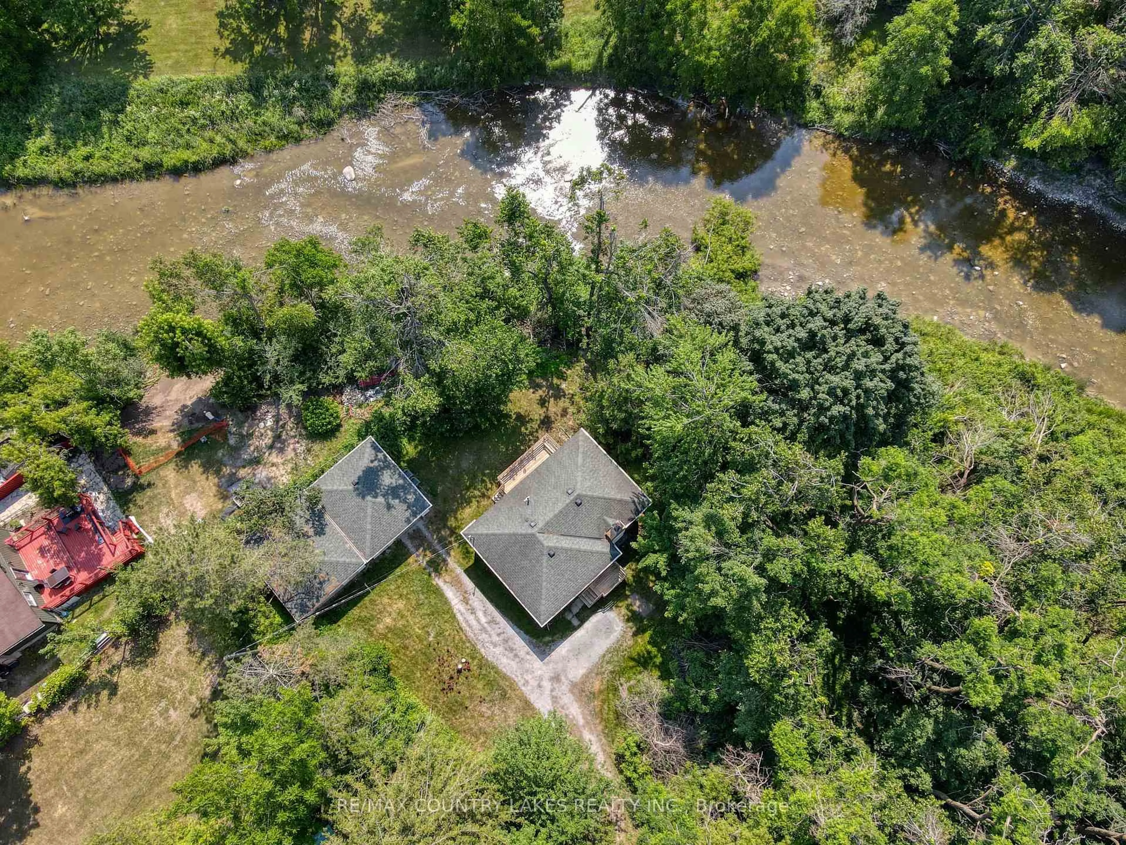 A pic from outside/outdoor area/front of a property/back of a property/a pic from drone, water/lake/river/ocean view for 413 Main St, Brock Ontario L0K 1A0