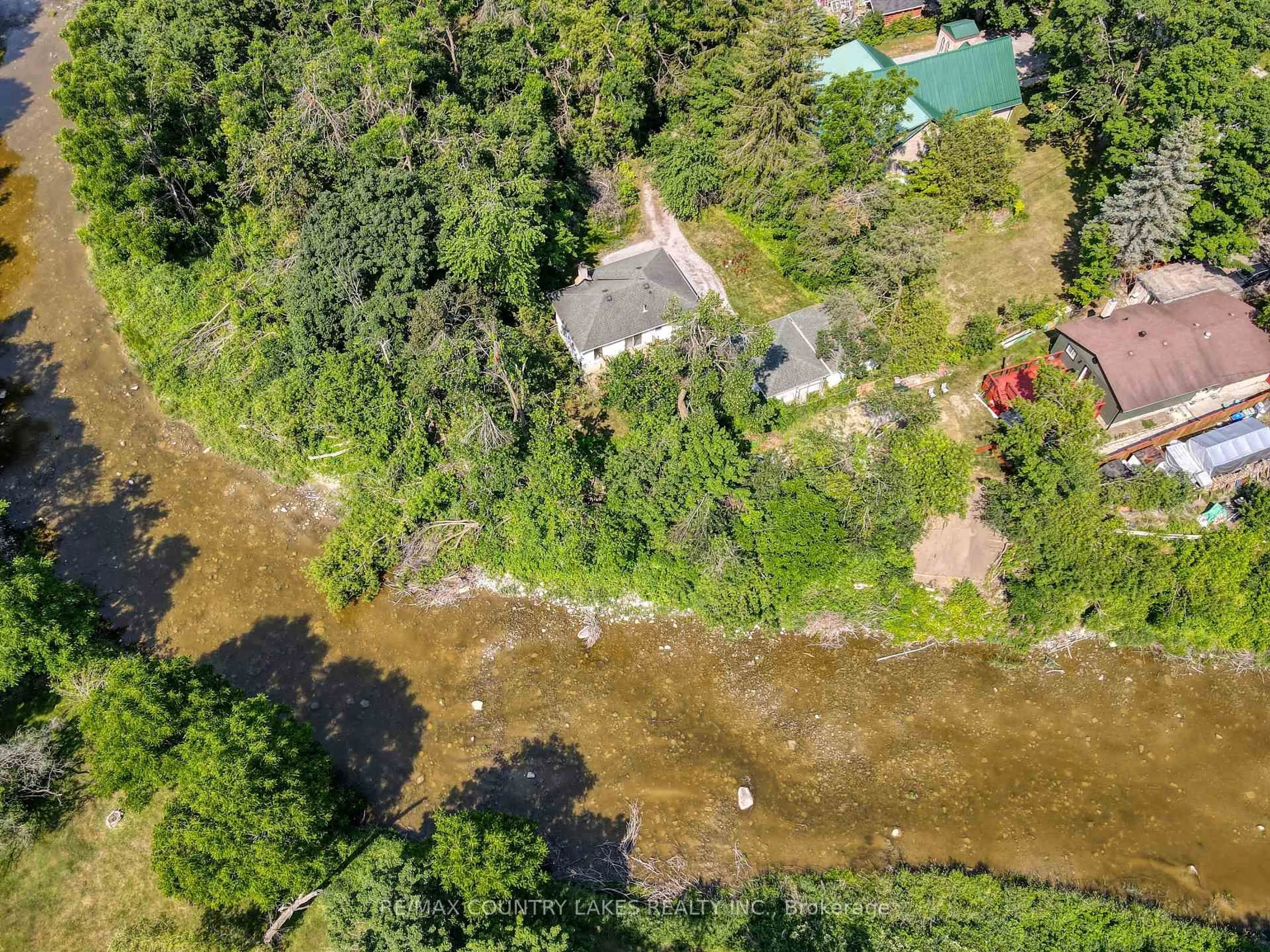 A pic from outside/outdoor area/front of a property/back of a property/a pic from drone, water/lake/river/ocean view for 413 Main St, Brock Ontario L0K 1A0