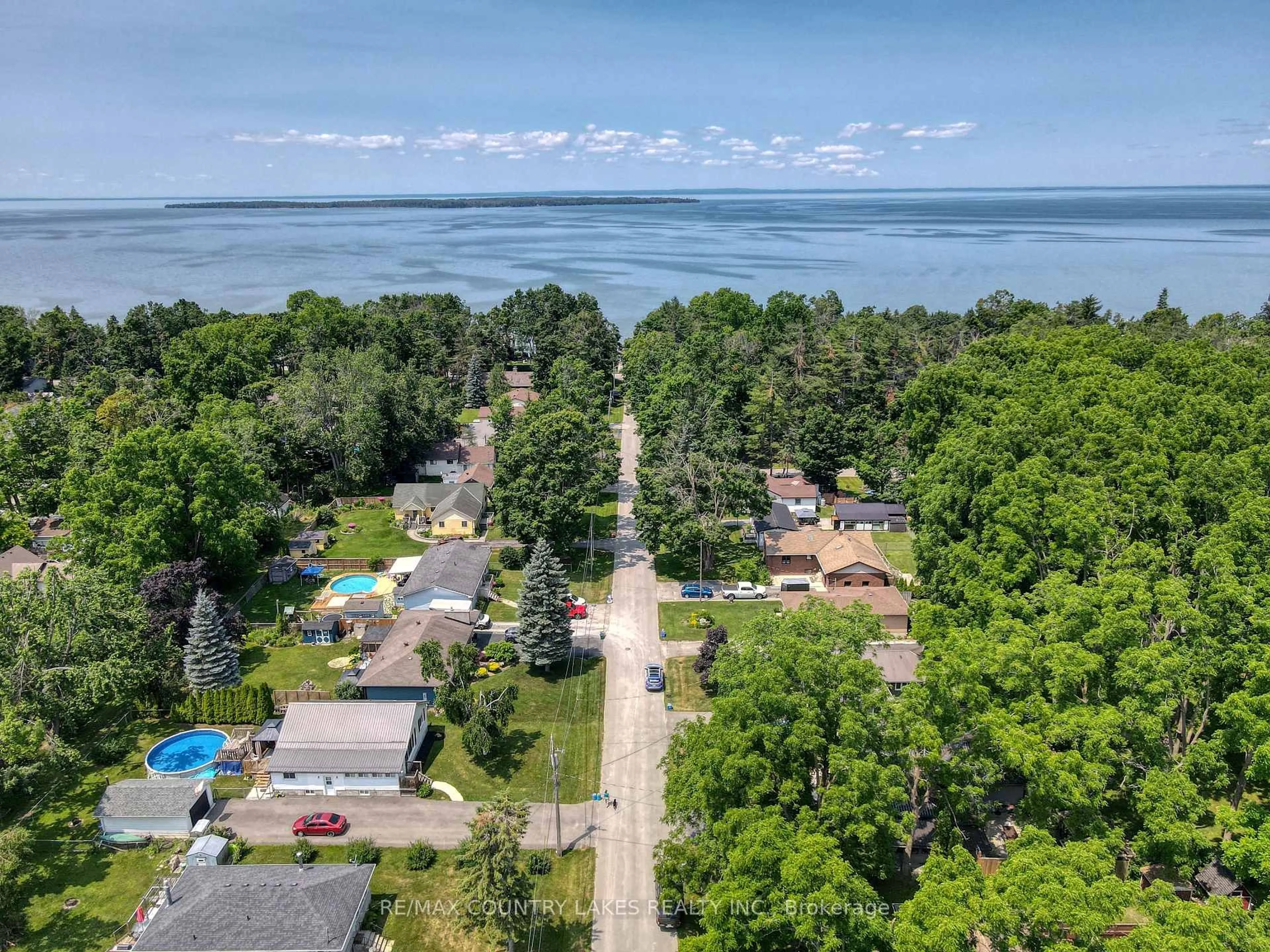 A pic from outside/outdoor area/front of a property/back of a property/a pic from drone, water/lake/river/ocean view for 116 Seventh St, Brock Ontario L0K 1A0