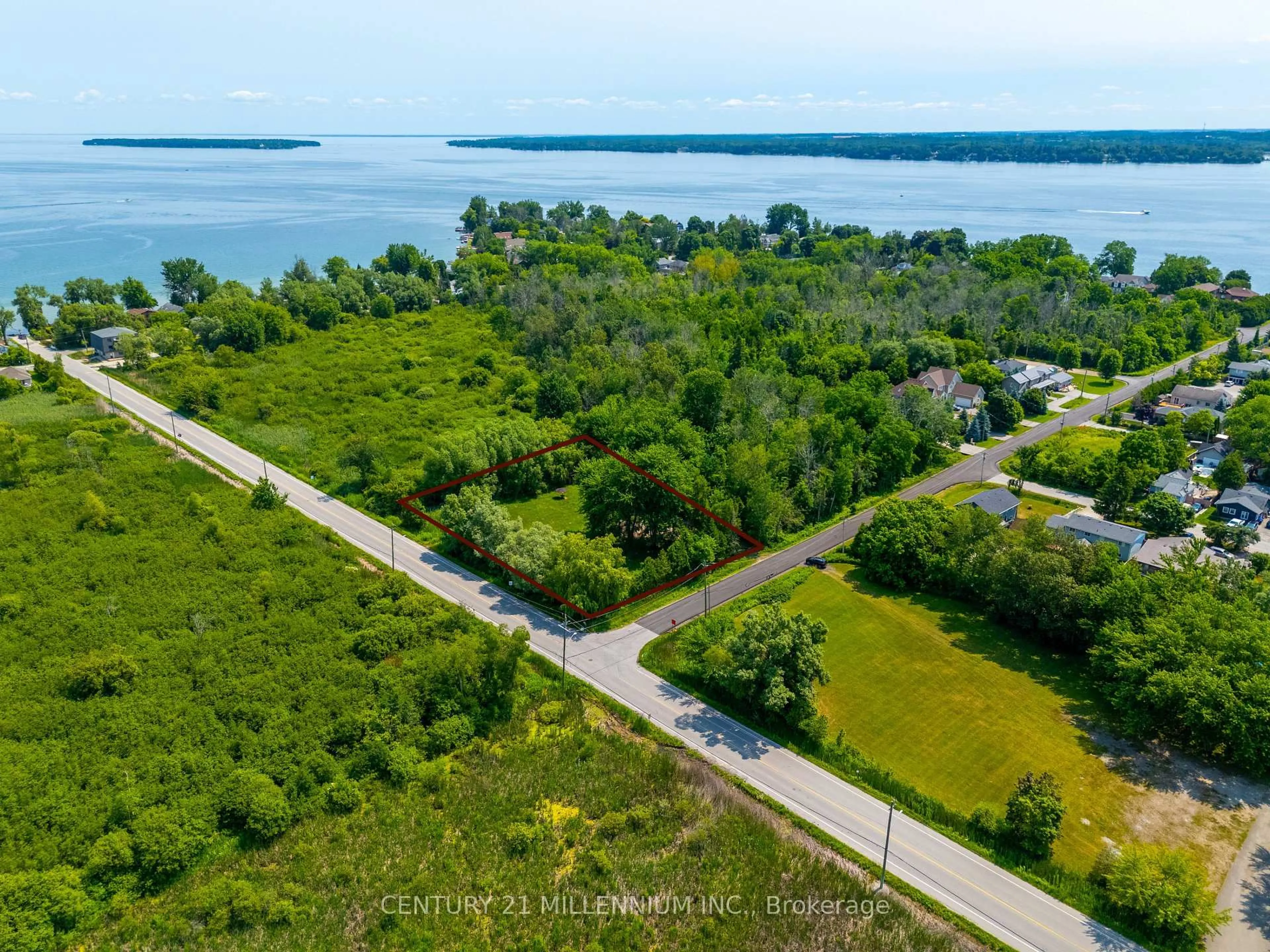A pic from outside/outdoor area/front of a property/back of a property/a pic from drone, water/lake/river/ocean view for 1027 Chapman St, Innisfil Ontario L0L 1W0