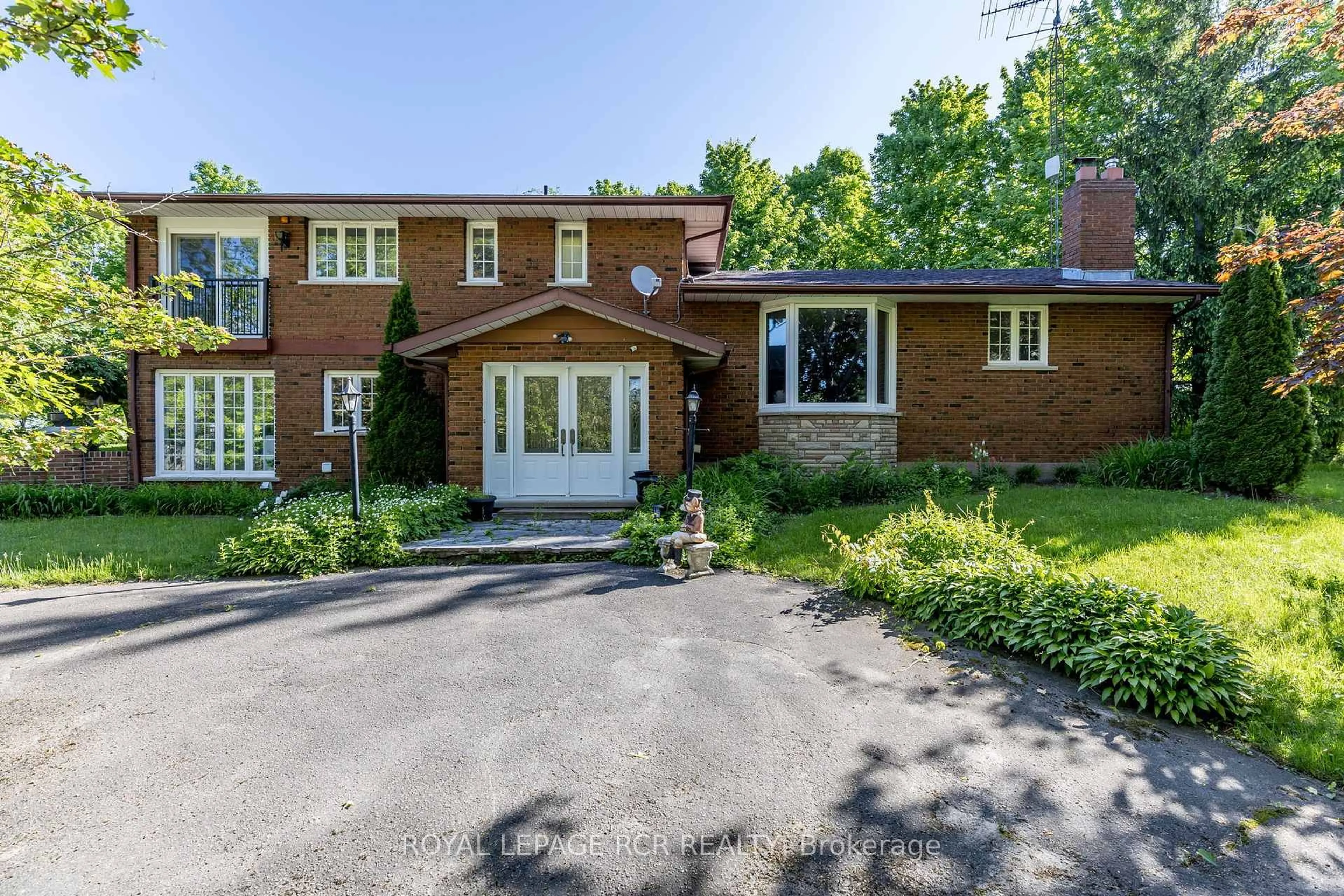 Home with brick exterior material, street for 2100 Davis Dr, King Ontario L3Y 4V9