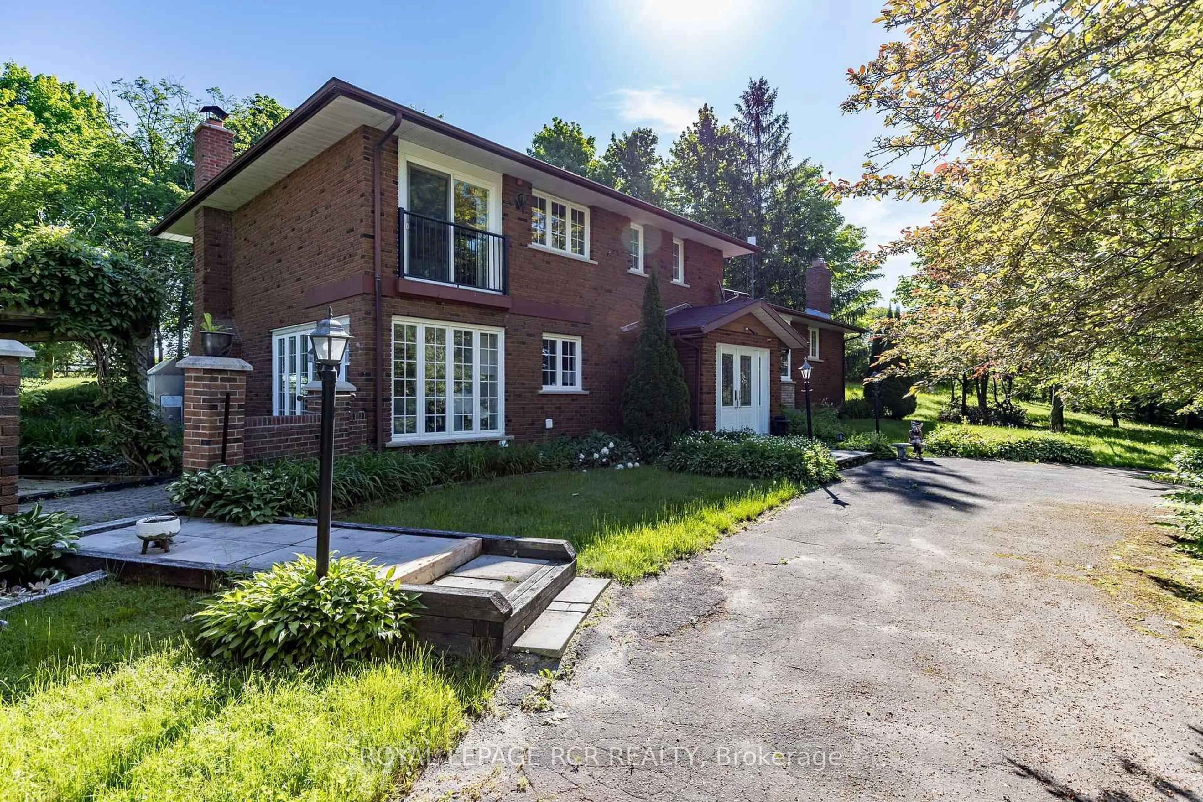 Home with brick exterior material, street for 2100 Davis Dr, King Ontario L3Y 4V9
