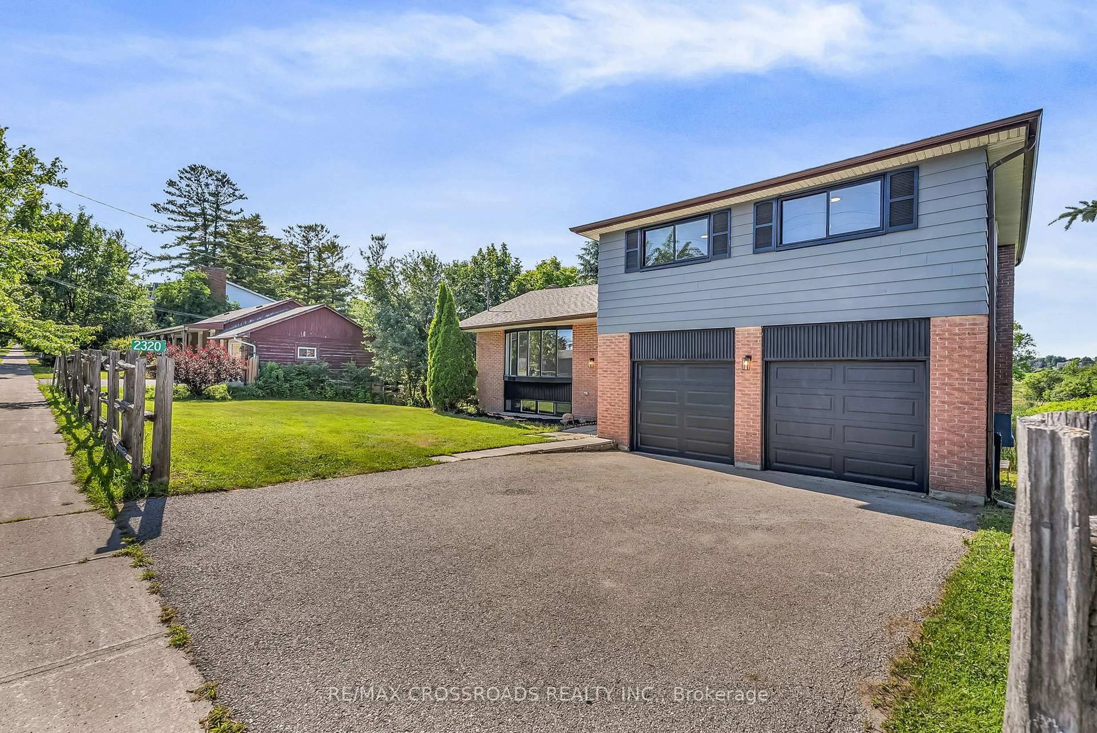 A pic from outside/outdoor area/front of a property/back of a property/a pic from drone, street for 2320 Line 8, Bradford West Gwillimbury Ontario L3Z 2B7