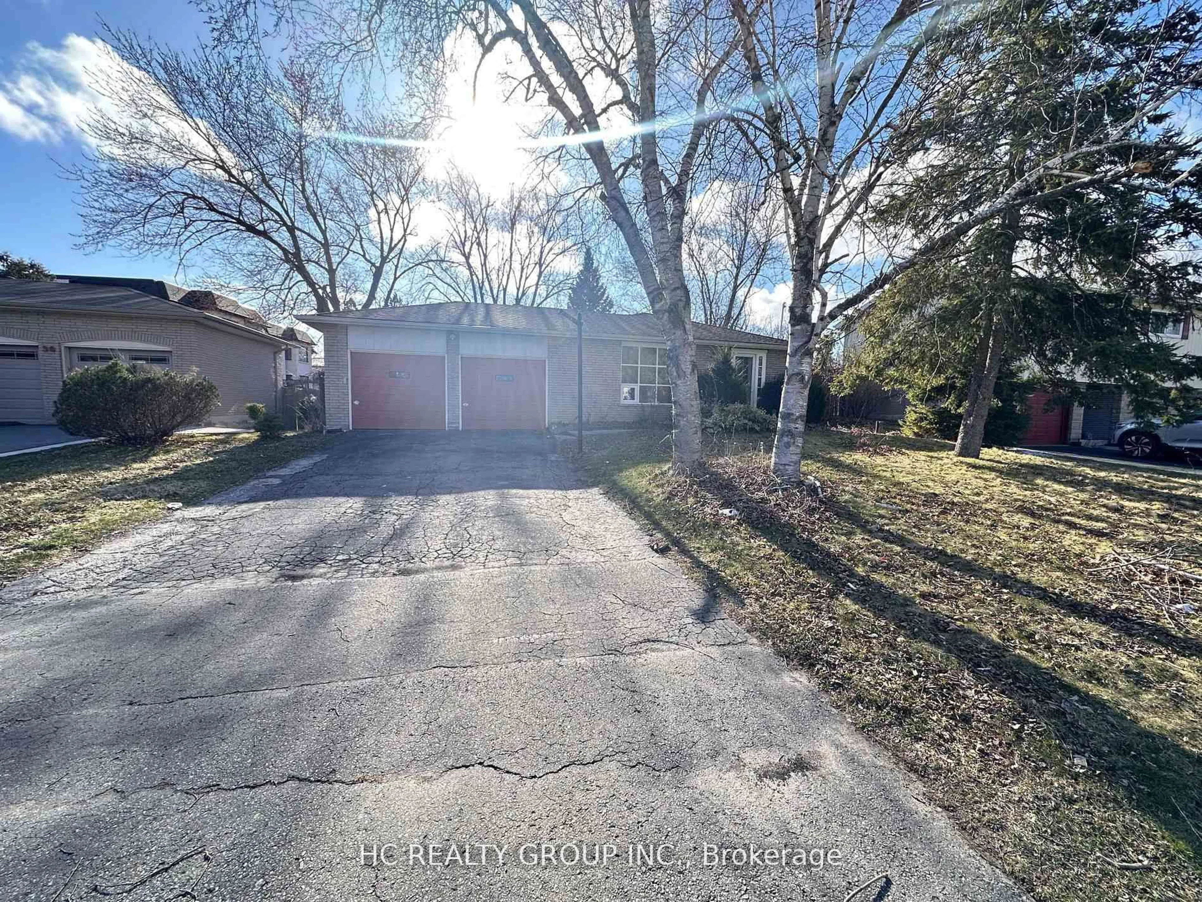 A pic from outside/outdoor area/front of a property/back of a property/a pic from drone, street for 32 Sciberras Rd, Markham Ontario L3R 2J3