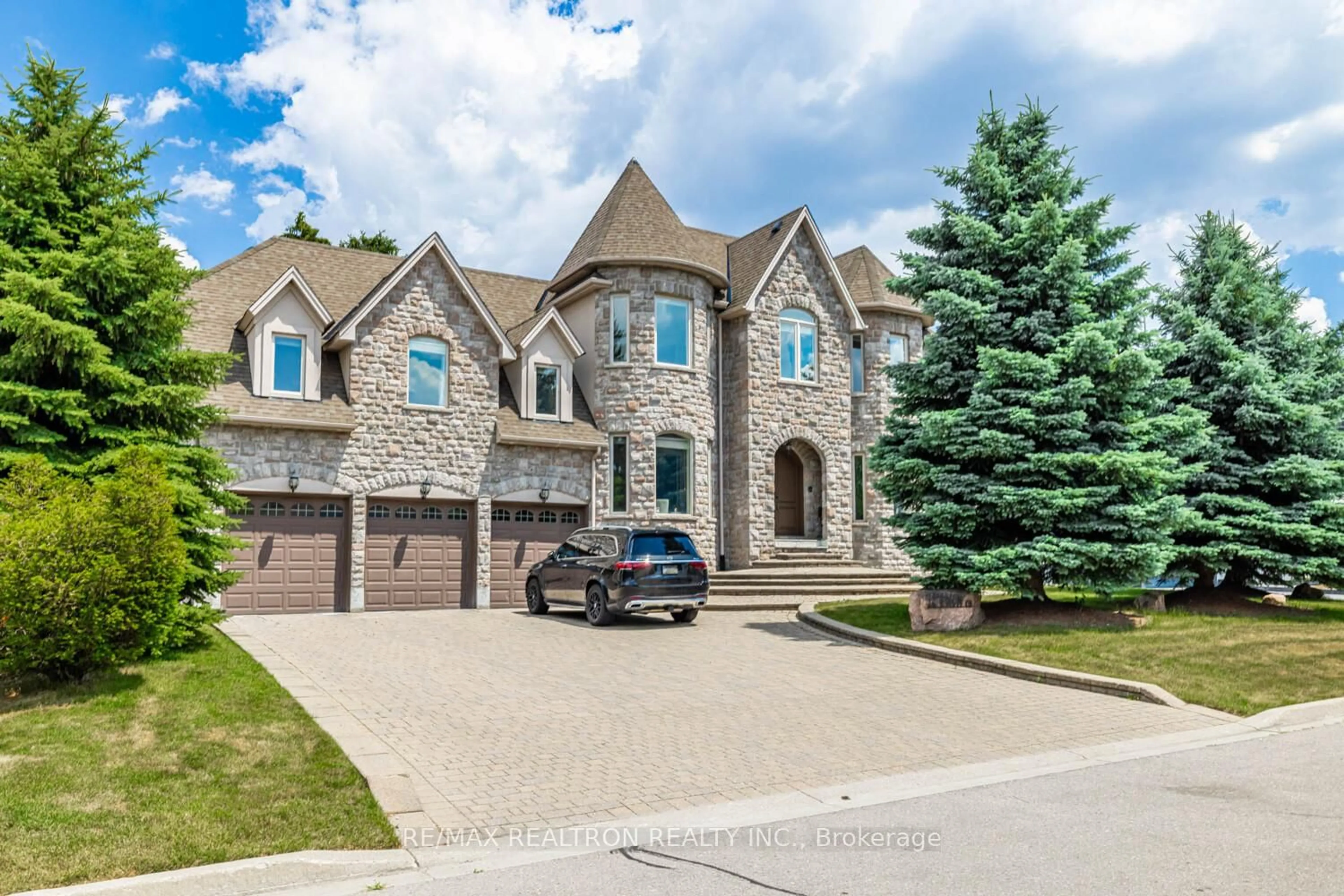 Home with brick exterior material, street for 12 Orlon Cres, Richmond Hill Ontario L4C 6S5
