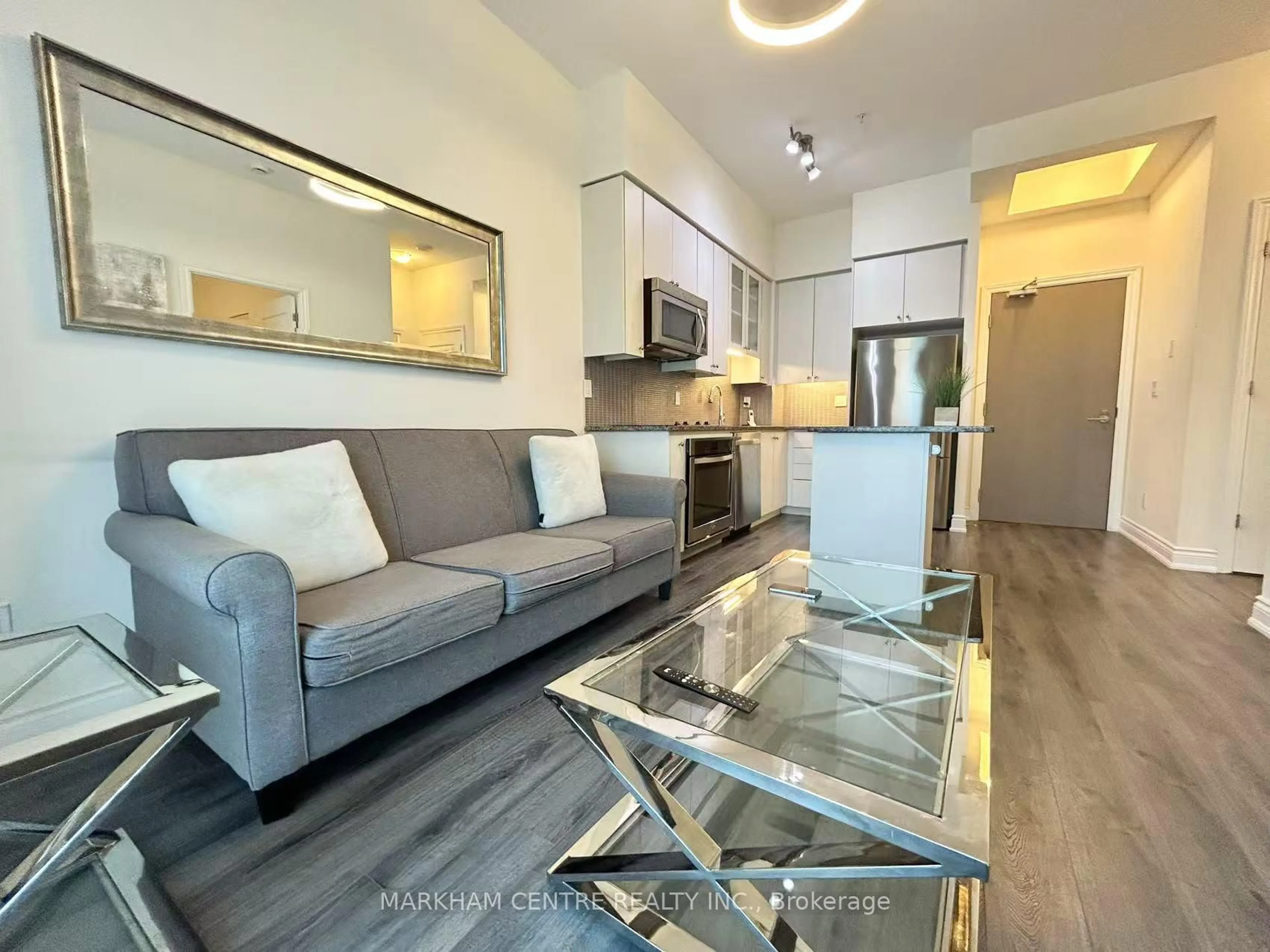Living room with furniture, unknown for 9090 Yonge St #103B, Richmond Hill Ontario L4C 0Z1