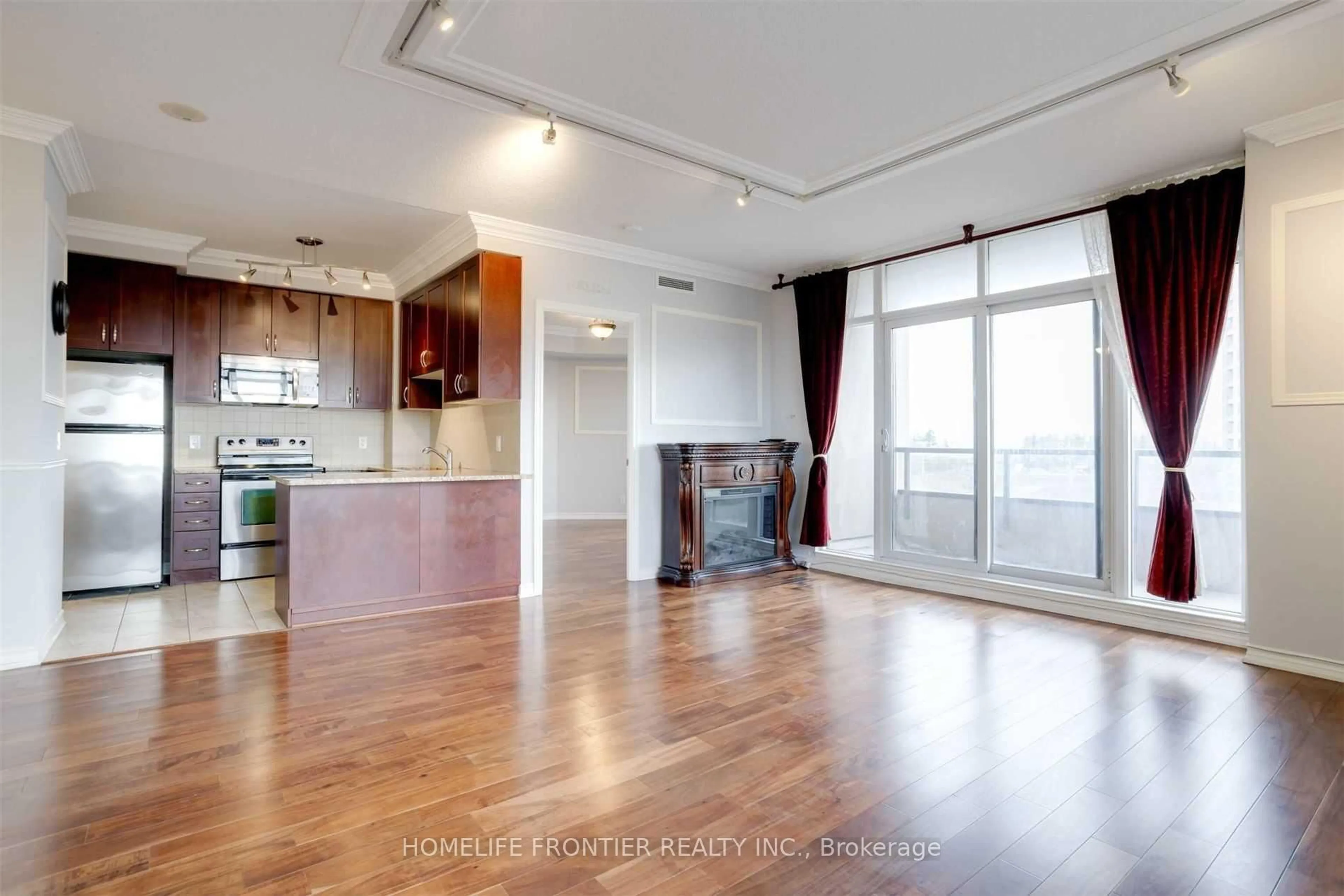 Open concept kitchen, wood/laminate floor for 9235 Jane St #511, Vaughan Ontario L6A 0J8