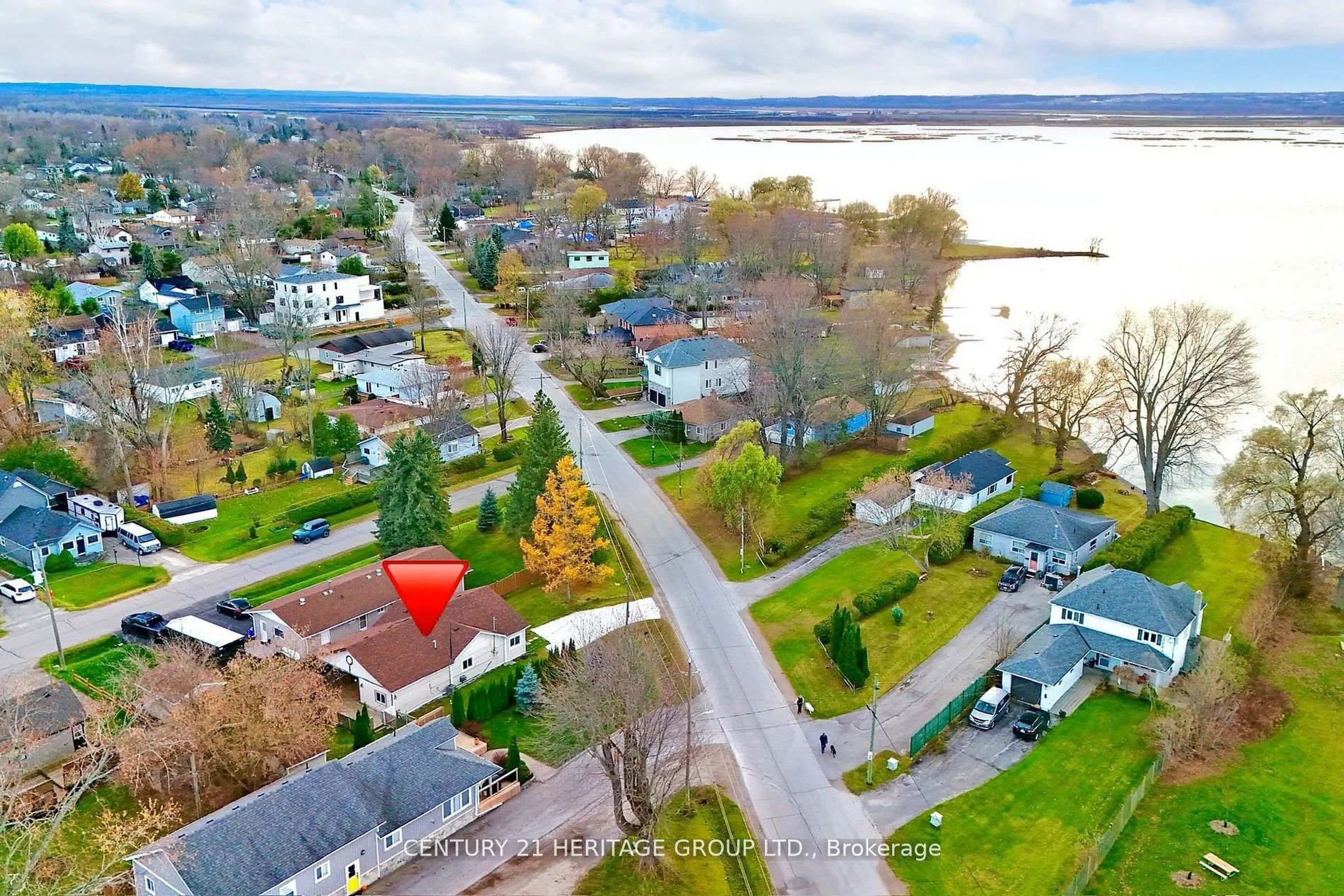 A pic from outside/outdoor area/front of a property/back of a property/a pic from drone, water/lake/river/ocean view for 493 Lake Dr, Georgina Ontario L4P 1R5