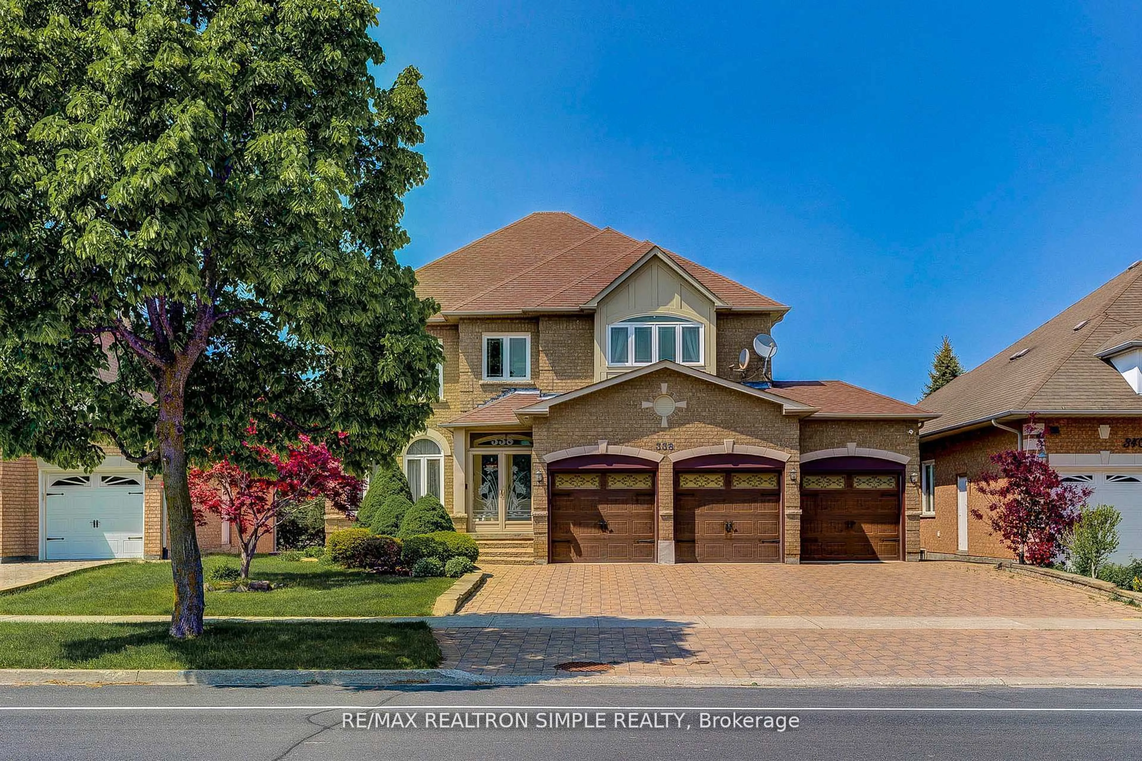 Home with brick exterior material, street for 338 Calvert Rd, Markham Ontario L6C 1Y2