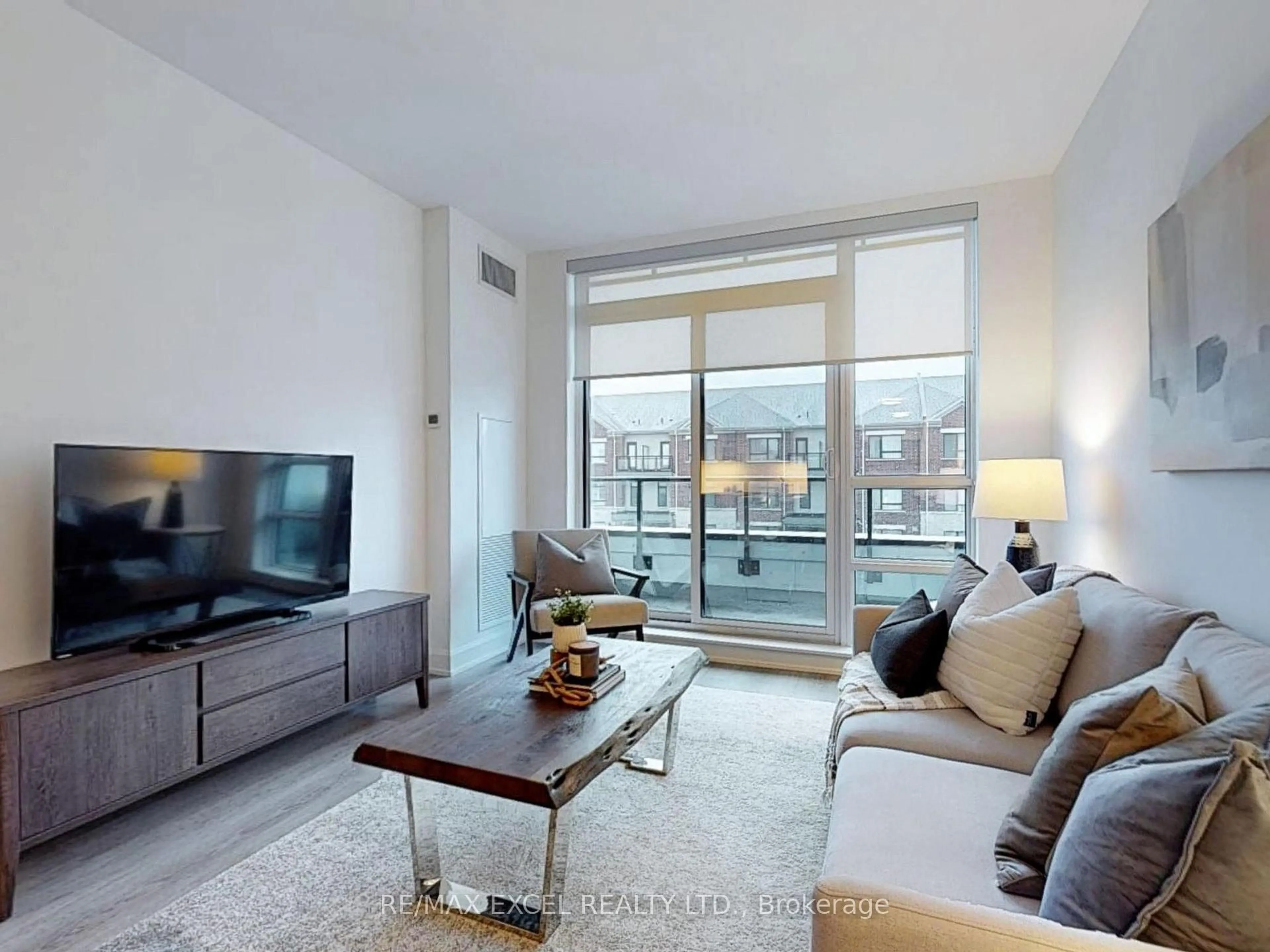 Living room with furniture, unknown for 12 Gandhi Lane #103, Markham Ontario L3T 0G8