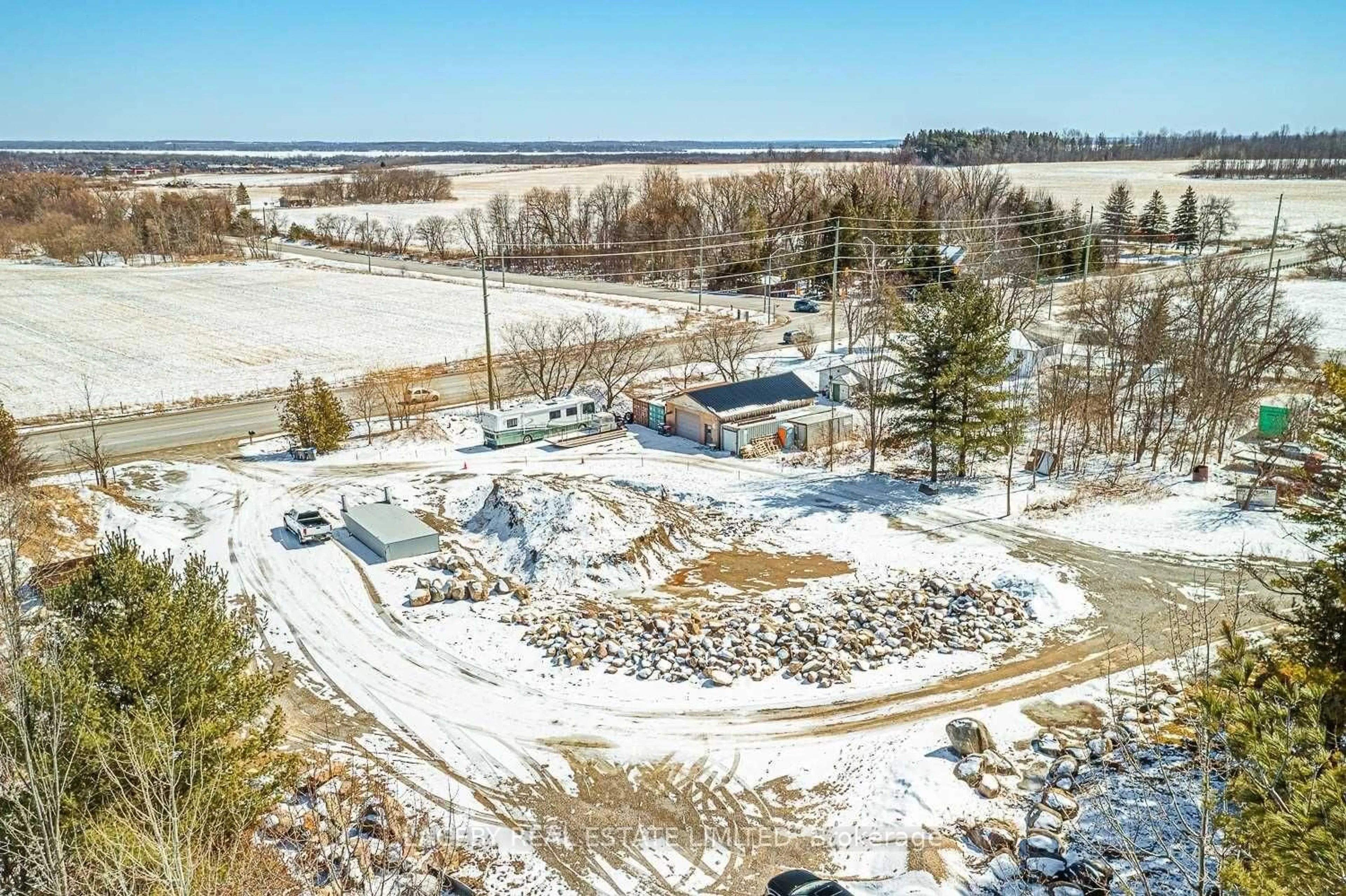 A pic from outside/outdoor area/front of a property/back of a property/a pic from drone, water/lake/river/ocean view for 1544 7th Line, Innisfil Ontario L9S 4H3