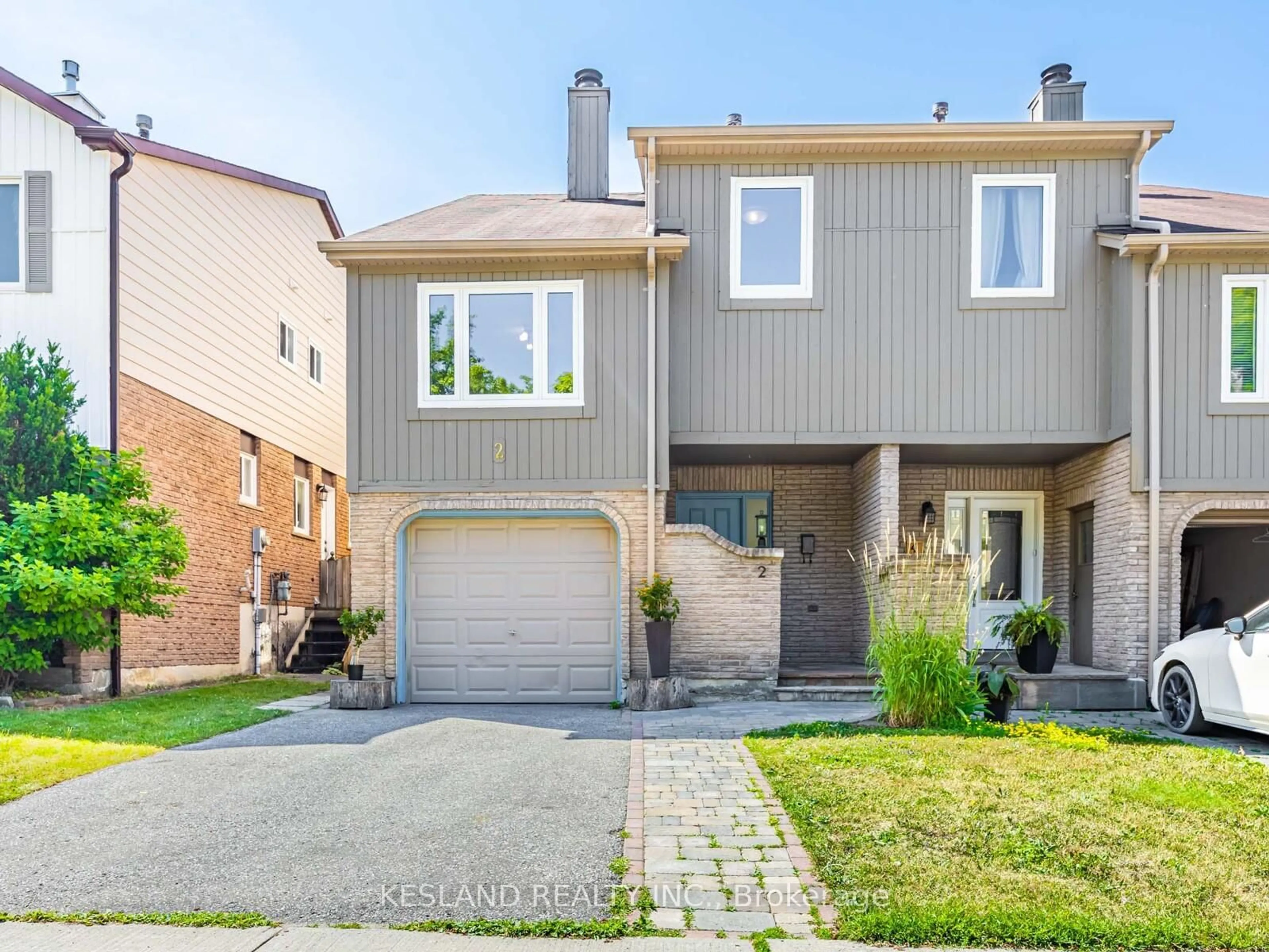 Home with brick exterior material, street for 2 Reginald Cres, Markham Ontario L3P 3T7
