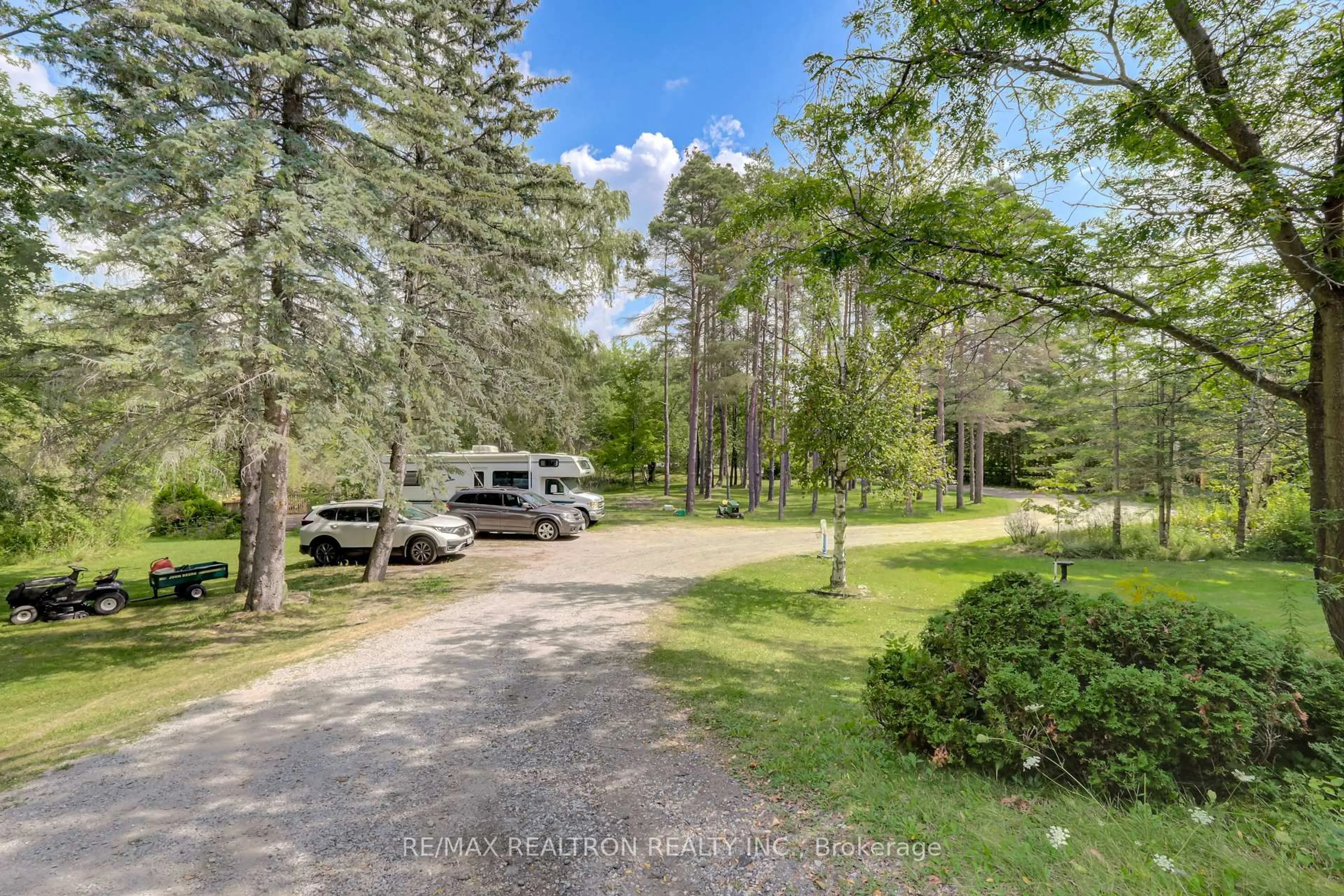 A pic from outside/outdoor area/front of a property/back of a property/a pic from drone, forest/trees view for 22284 Kennedy Rd, East Gwillimbury Ontario L0G 1R0