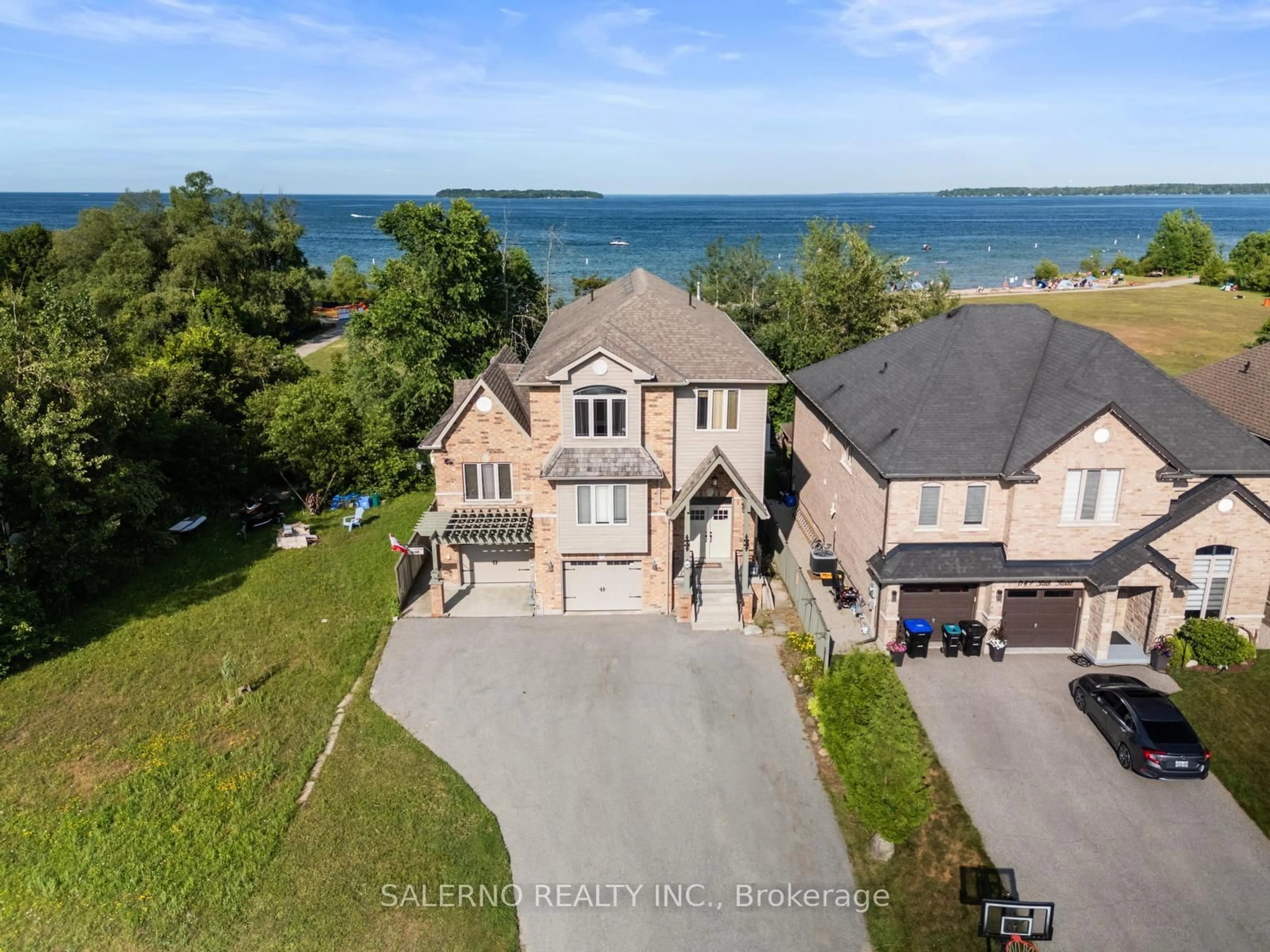 A pic from outside/outdoor area/front of a property/back of a property/a pic from drone, water/lake/river/ocean view for 645 Park Rd, Innisfil Ontario L9S 2E1