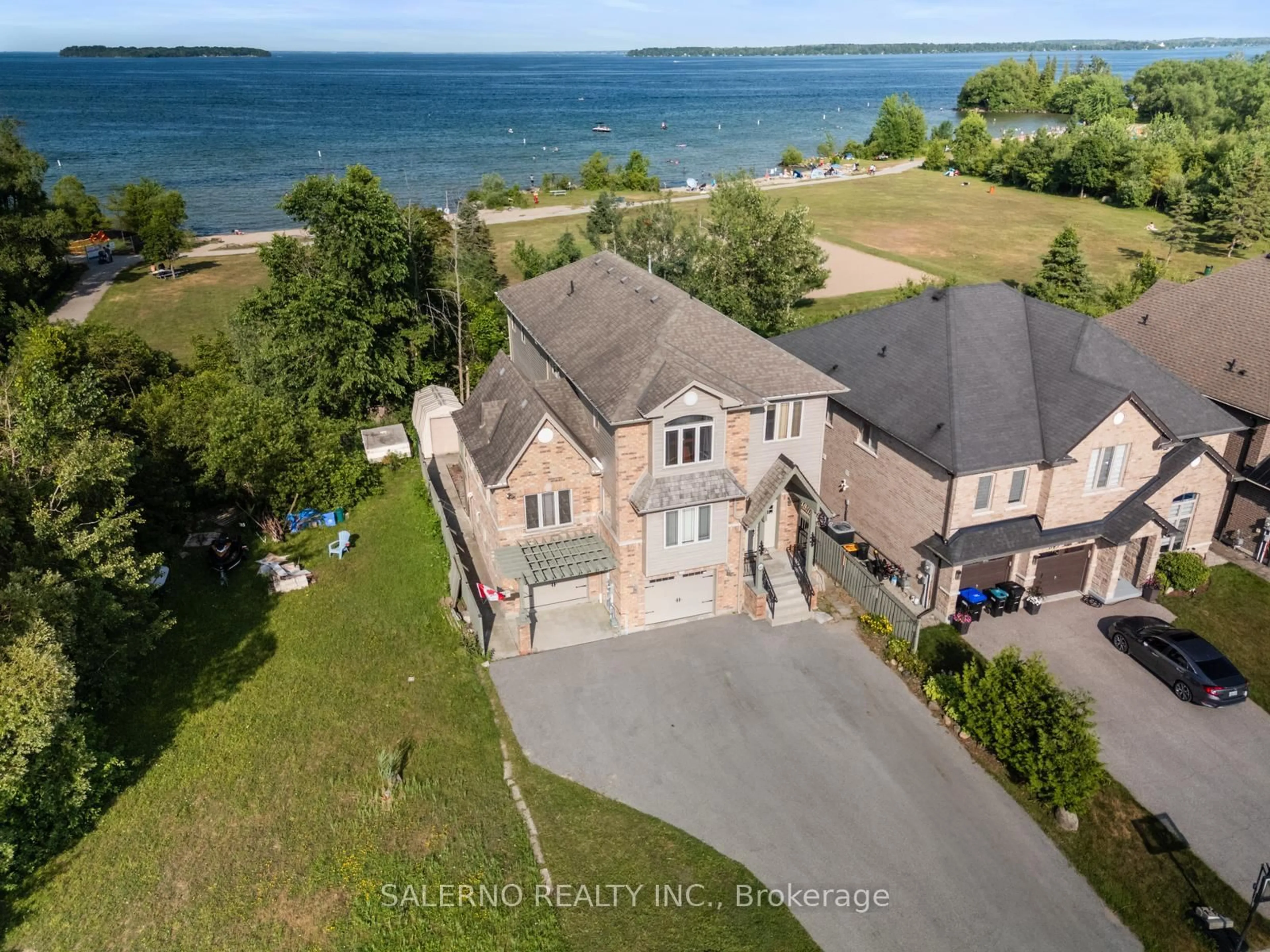 A pic from outside/outdoor area/front of a property/back of a property/a pic from drone, water/lake/river/ocean view for 645 Park Rd, Innisfil Ontario L9S 2E1