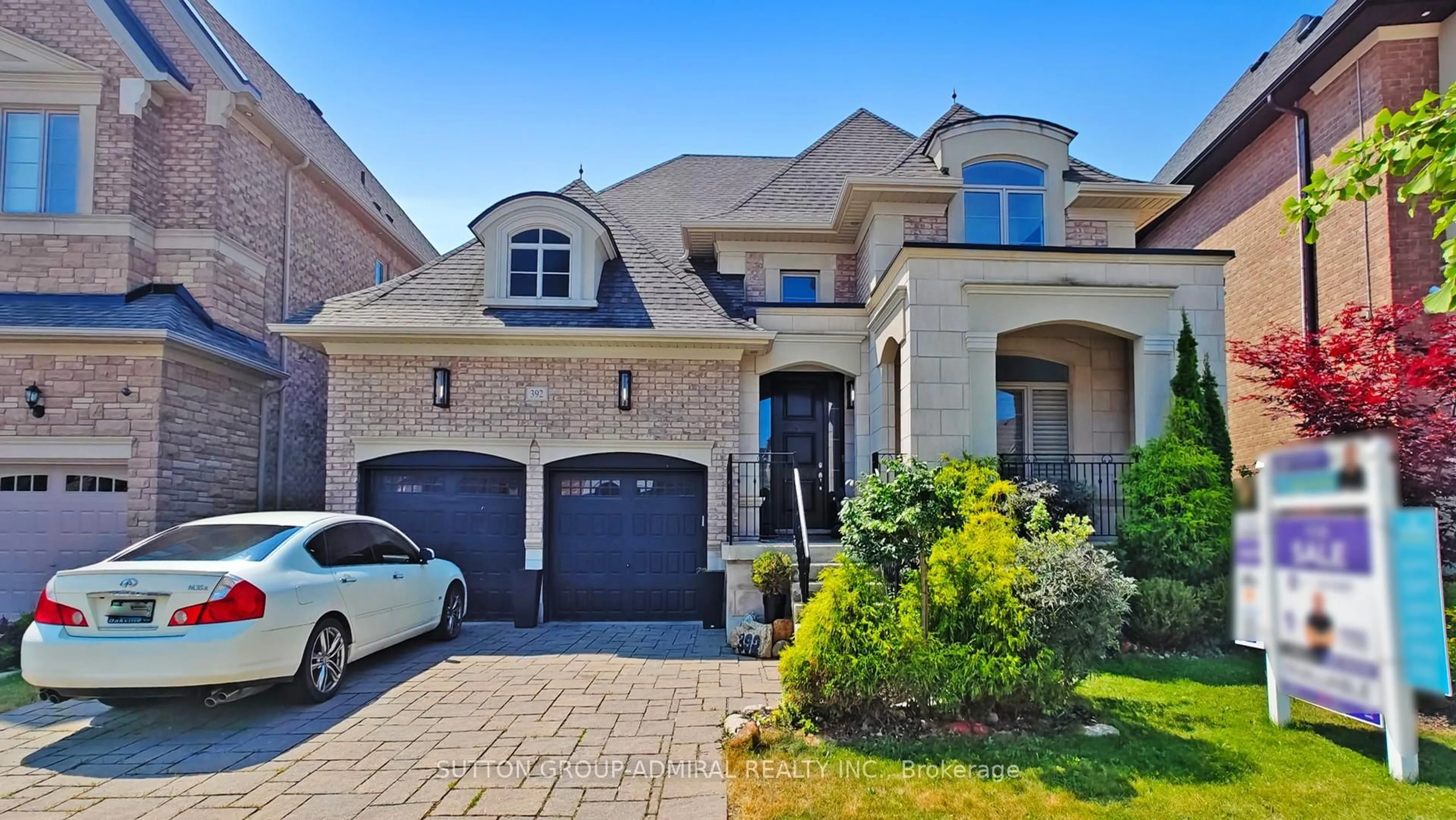 Home with brick exterior material, street for 392 Woodgate Pines Dr, Vaughan Ontario L4H 3X4