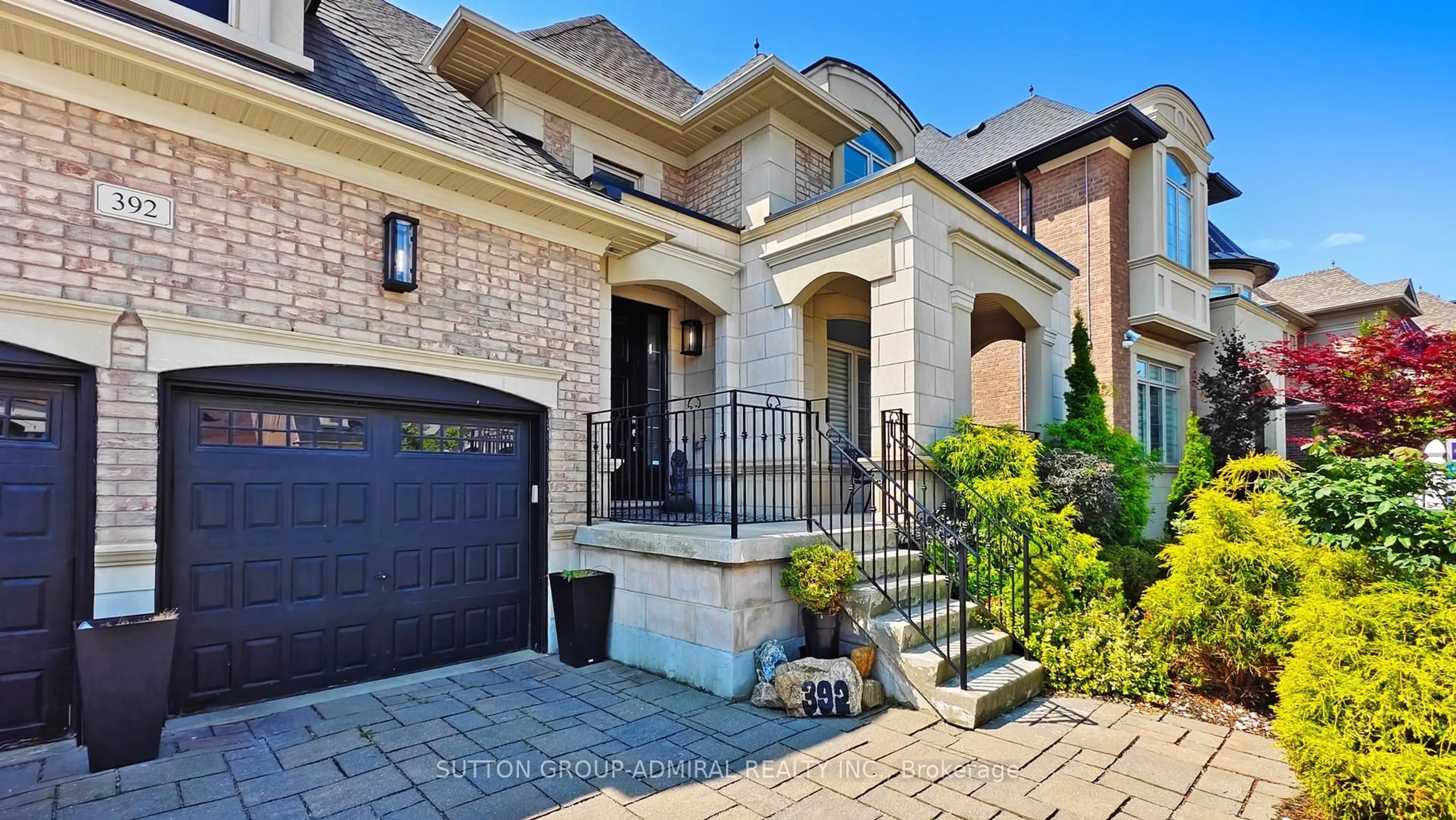 Home with brick exterior material, street for 392 Woodgate Pines Dr, Vaughan Ontario L4H 3X4