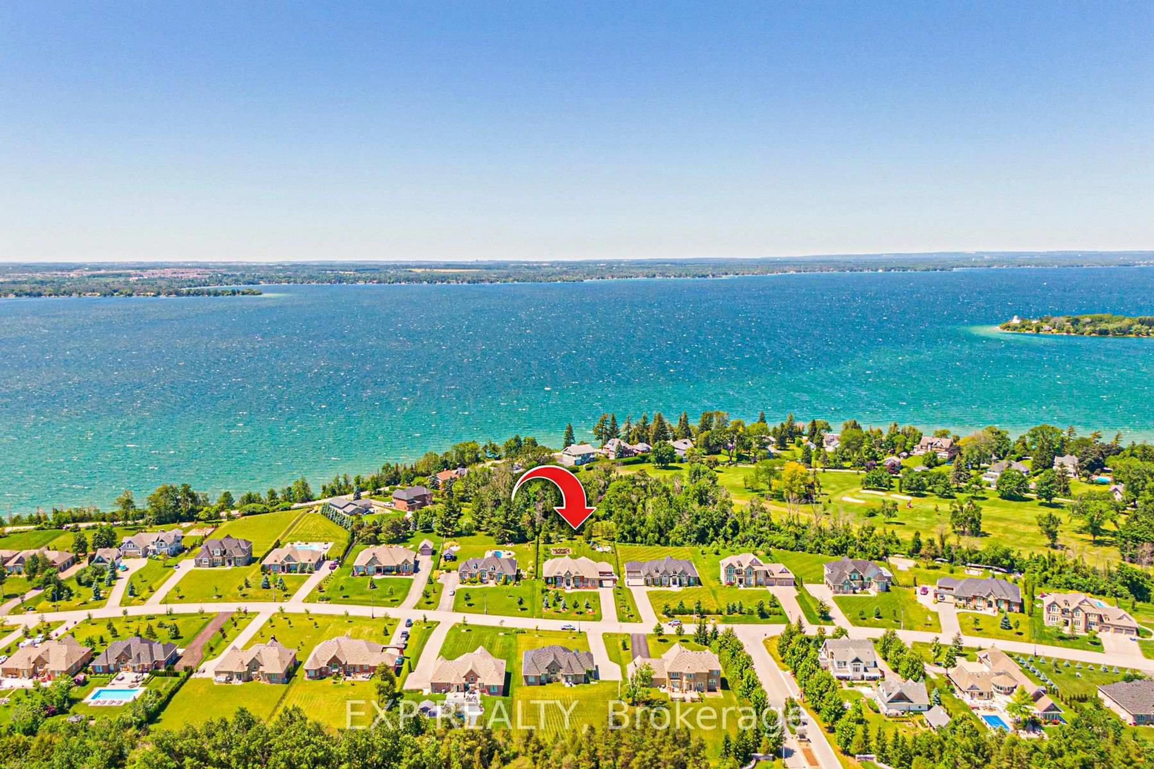 A pic from outside/outdoor area/front of a property/back of a property/a pic from drone, water/lake/river/ocean view for 18 Wolford Crt, Georgina Ontario L4P 0B1