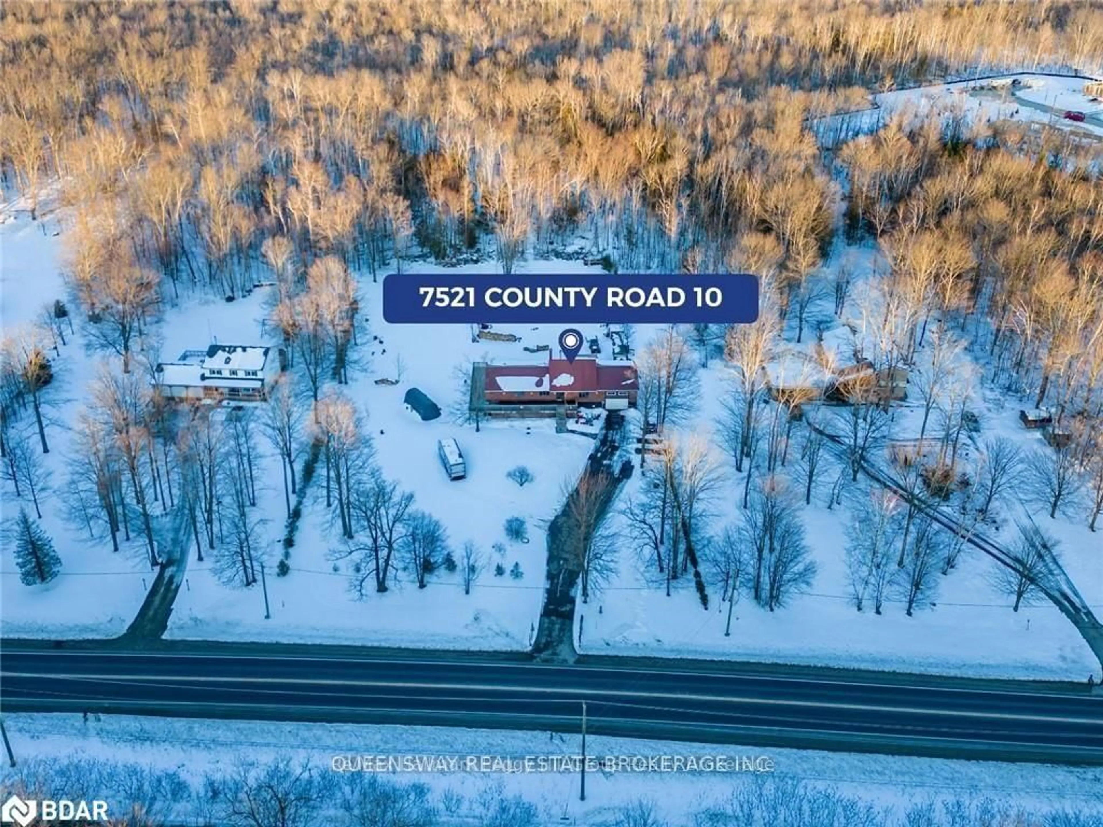 A pic from outside/outdoor area/front of a property/back of a property/a pic from drone, street for 7521 County Road 10, Essa Ontario L0M 1B1