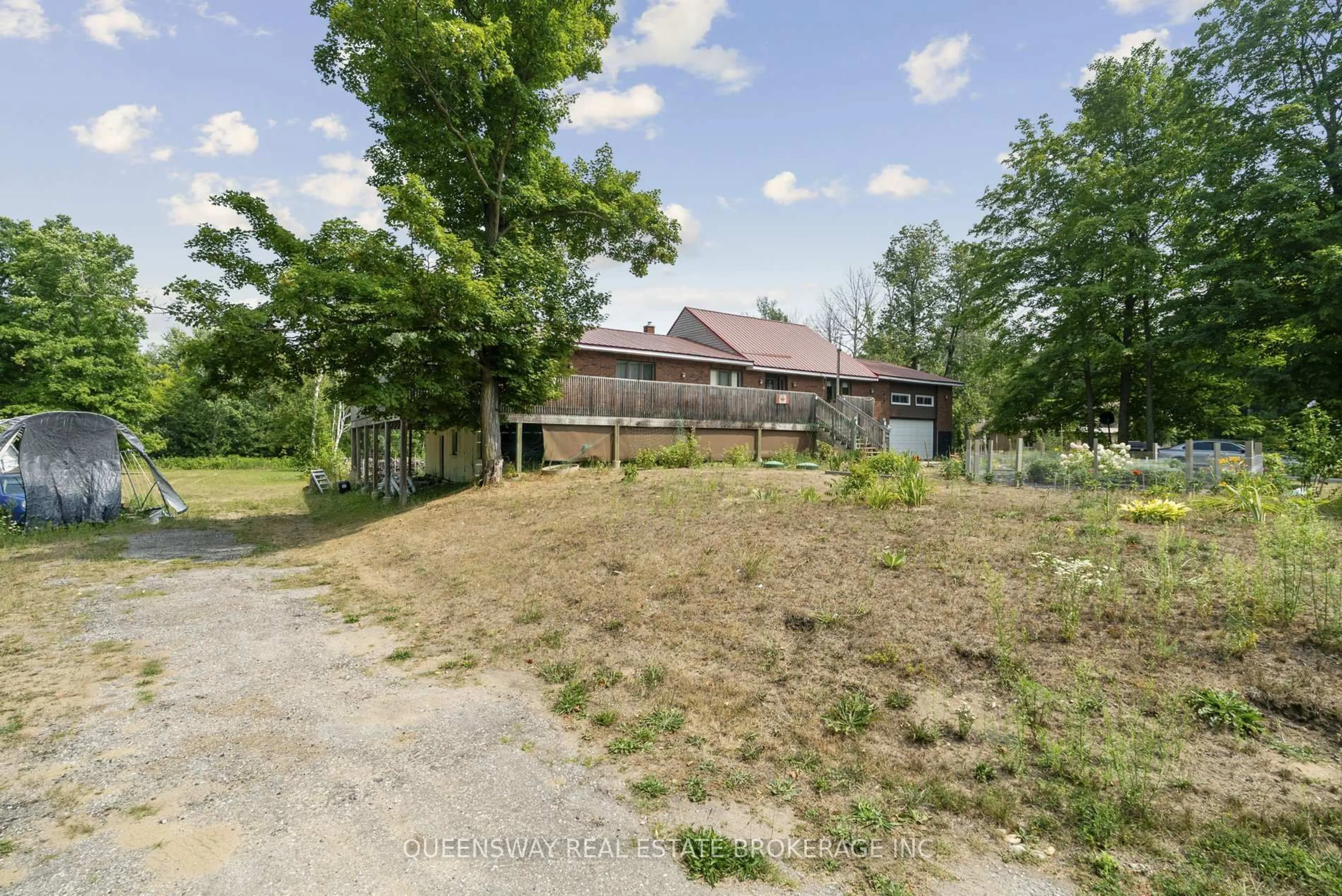 A pic from outside/outdoor area/front of a property/back of a property/a pic from drone, building for 7521 County Road 10, Essa Ontario L0M 1B1