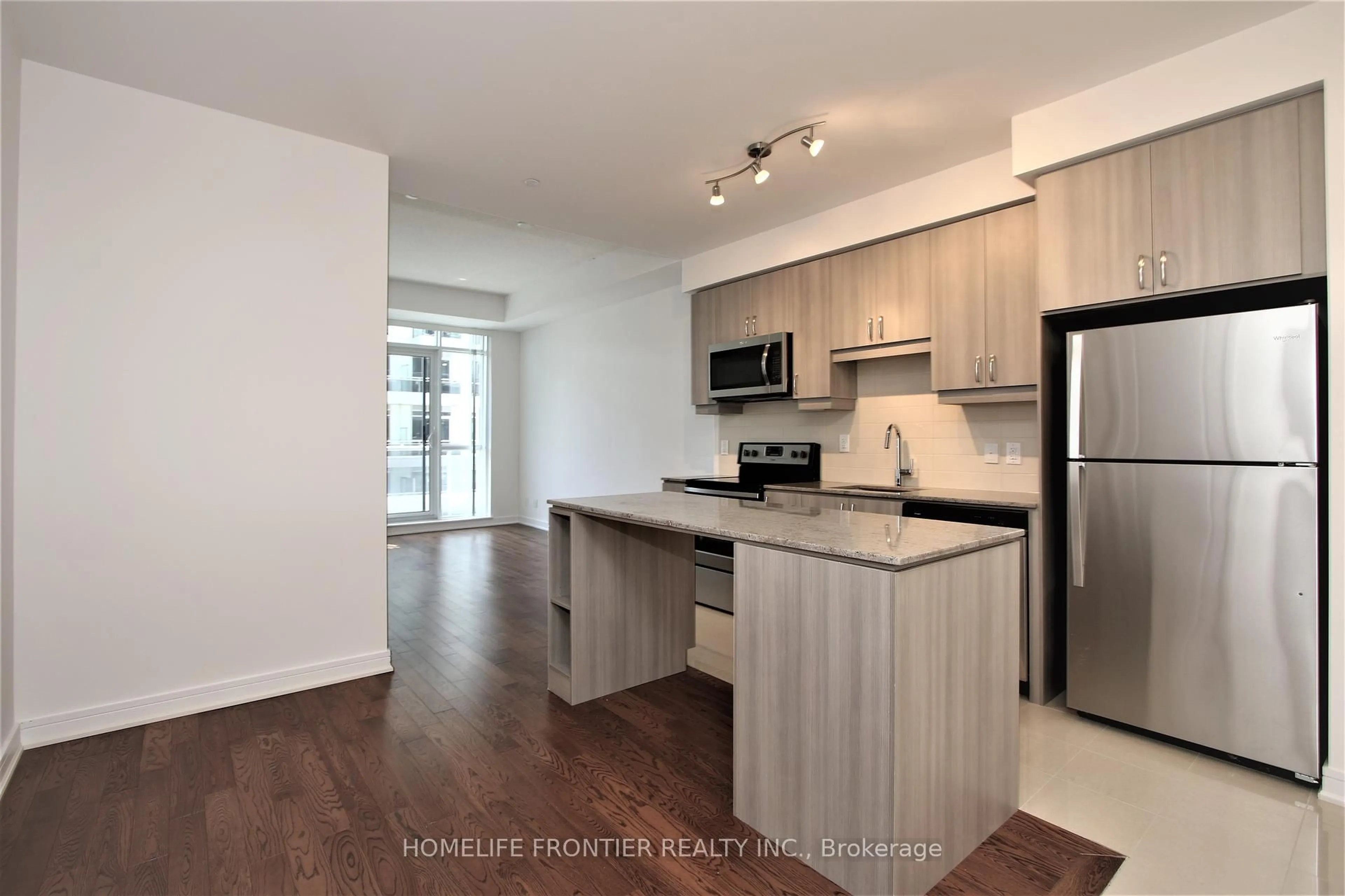 Open concept kitchen, wood/laminate floor for 9201 Yonge St #807, Richmond Hill Ontario L4C 6Z2