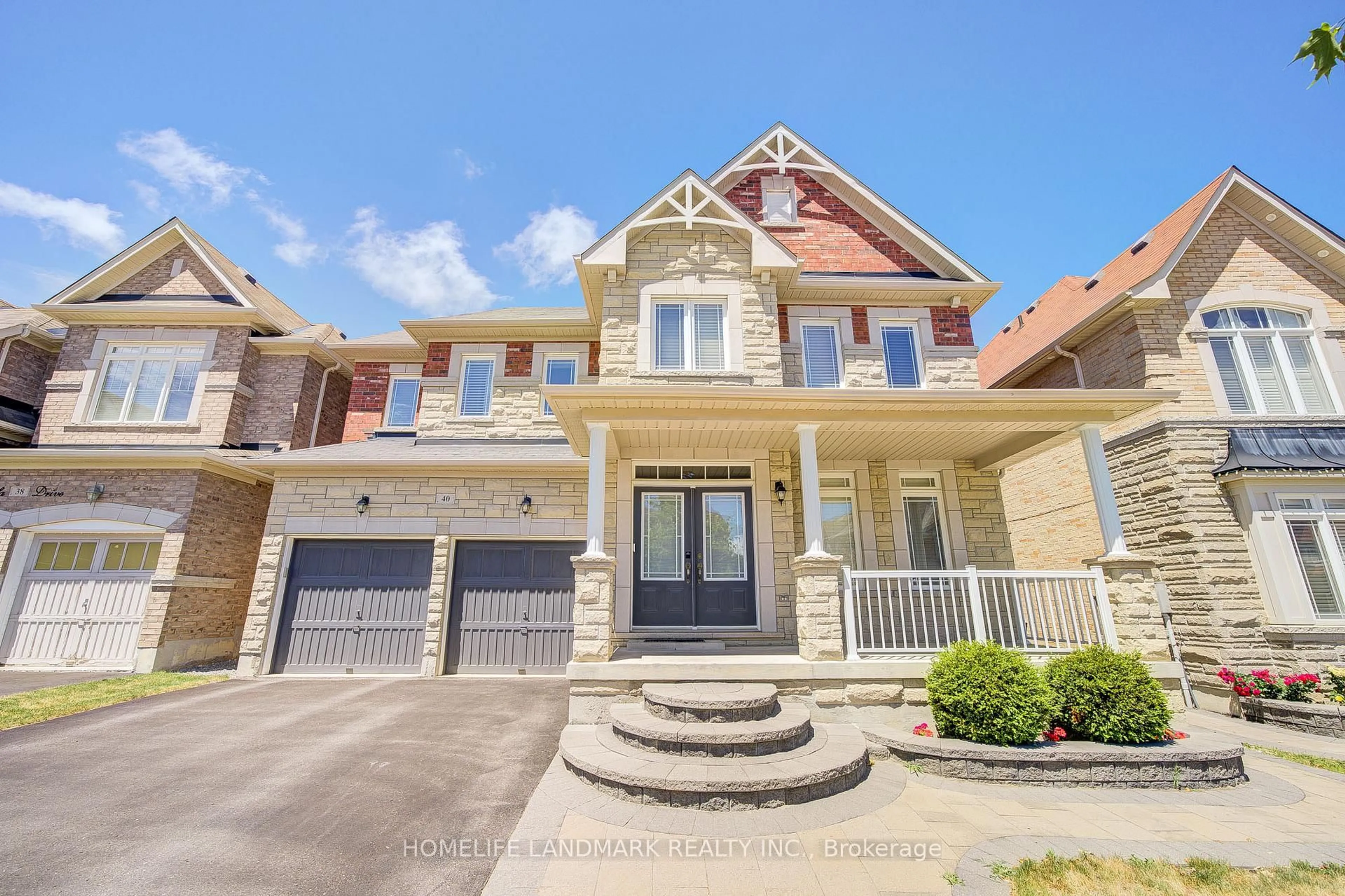 Home with brick exterior material, street for 40 Bitola Dr, Markham Ontario L6E 0M7