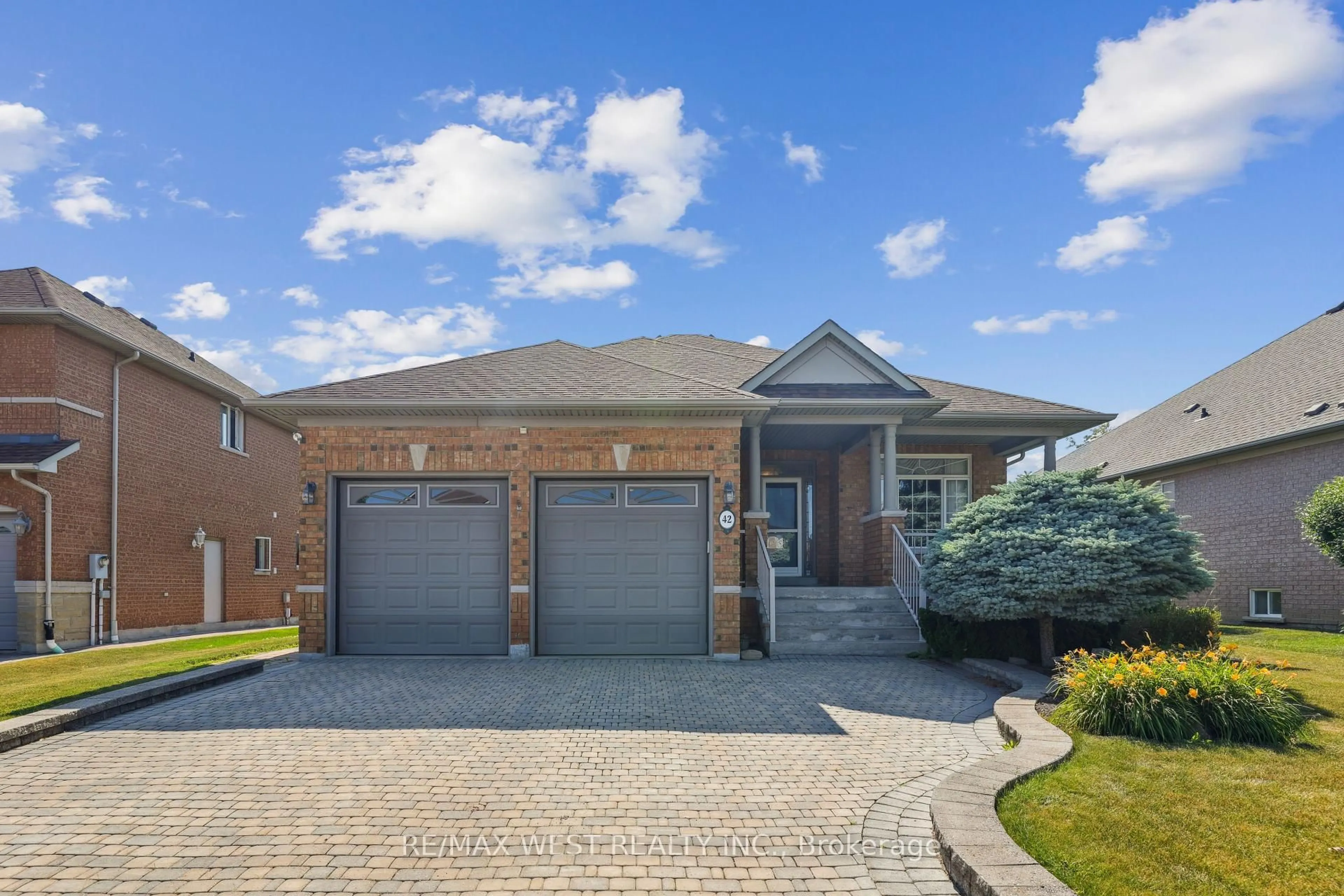 Home with brick exterior material, street for 42 Windrose Crt, Vaughan Ontario L4L 9G9